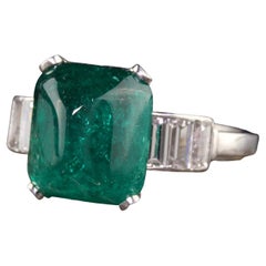 Antique Art Deco Platinum Sugarloaf Emerald and Baguette Diamond Ring, GIA