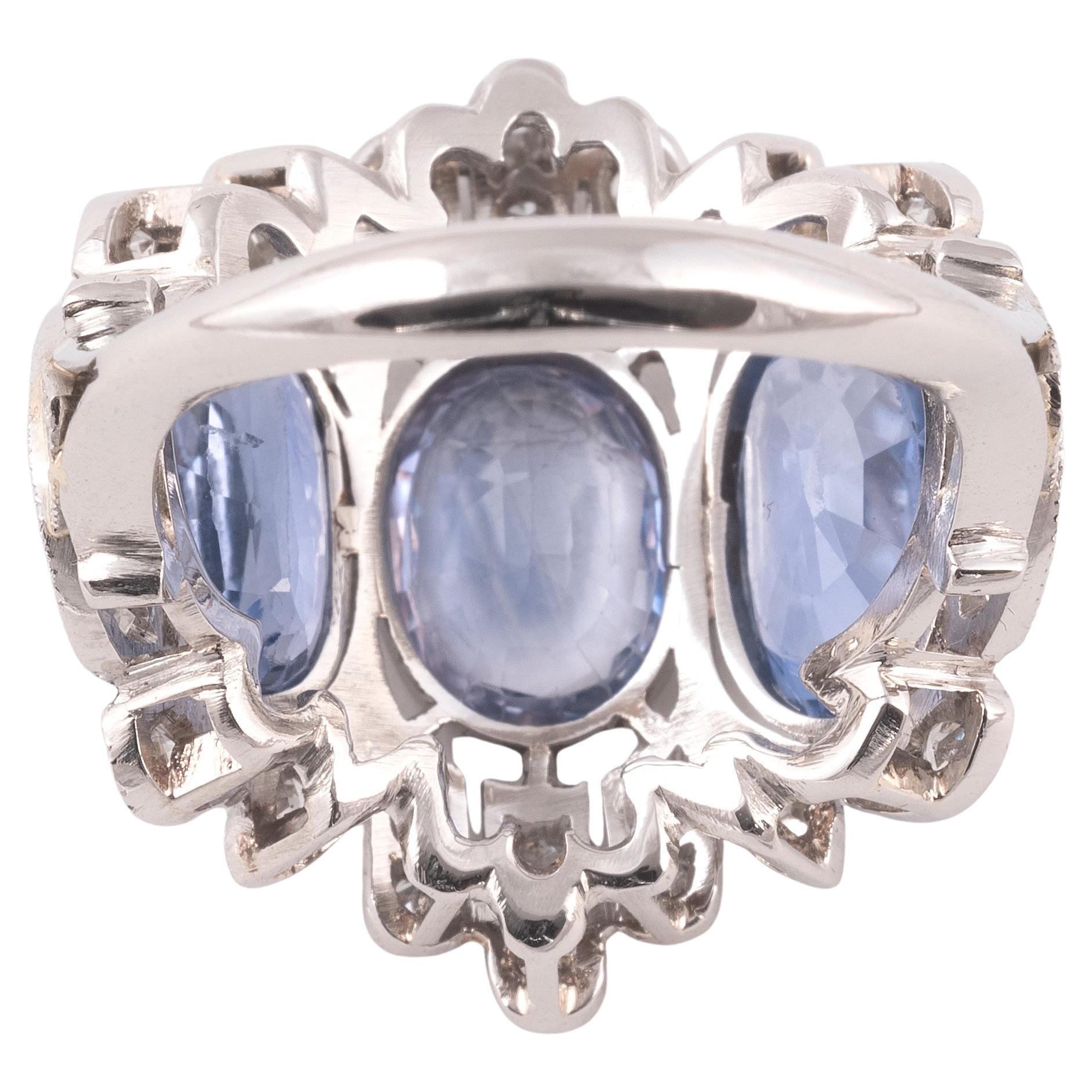 Anillo vintage de platino con tres zafiros y diamantes talla antigua Retro