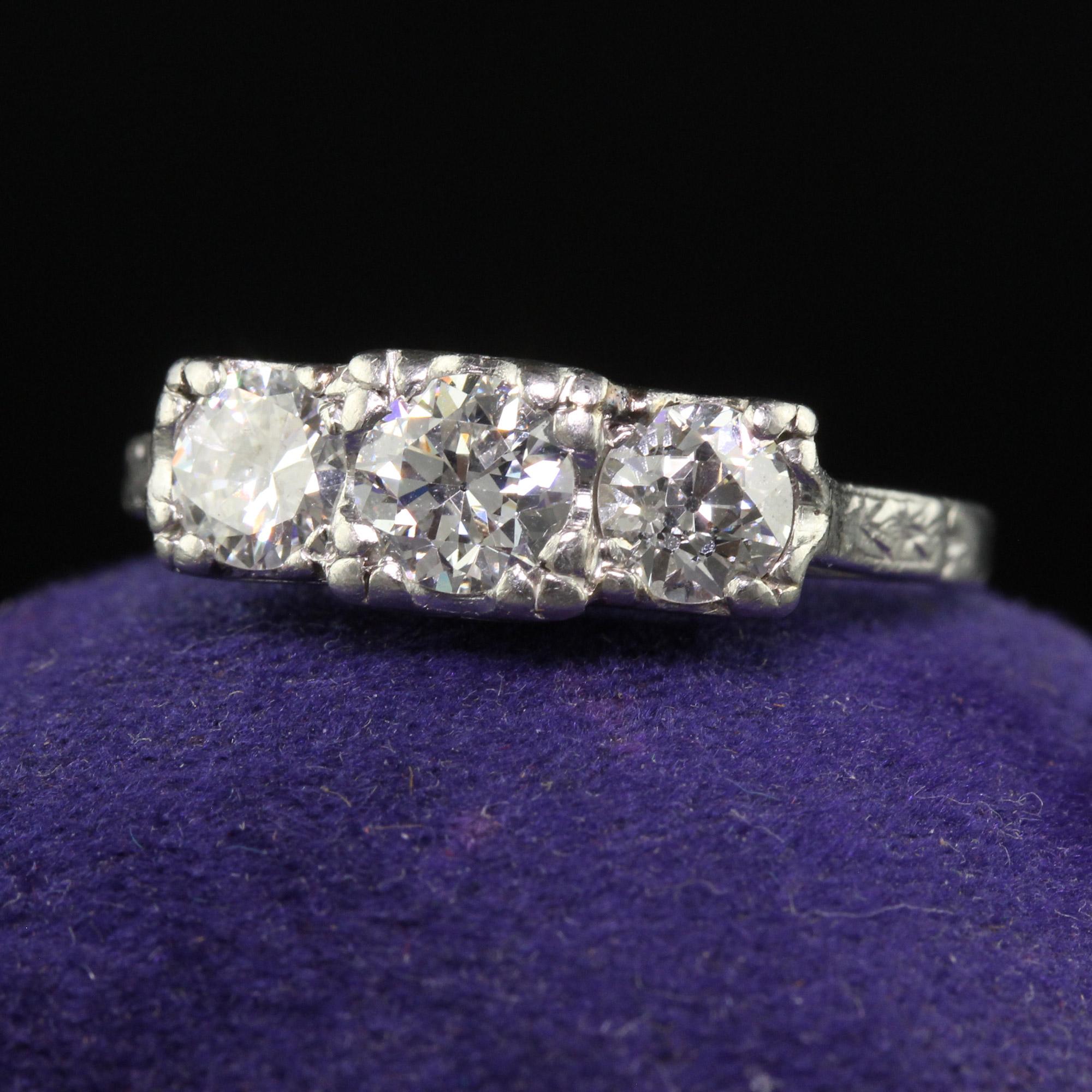 Antique Art Deco Platinum Three Stone Old European Diamond Engraved Ring In Good Condition For Sale In Great Neck, NY