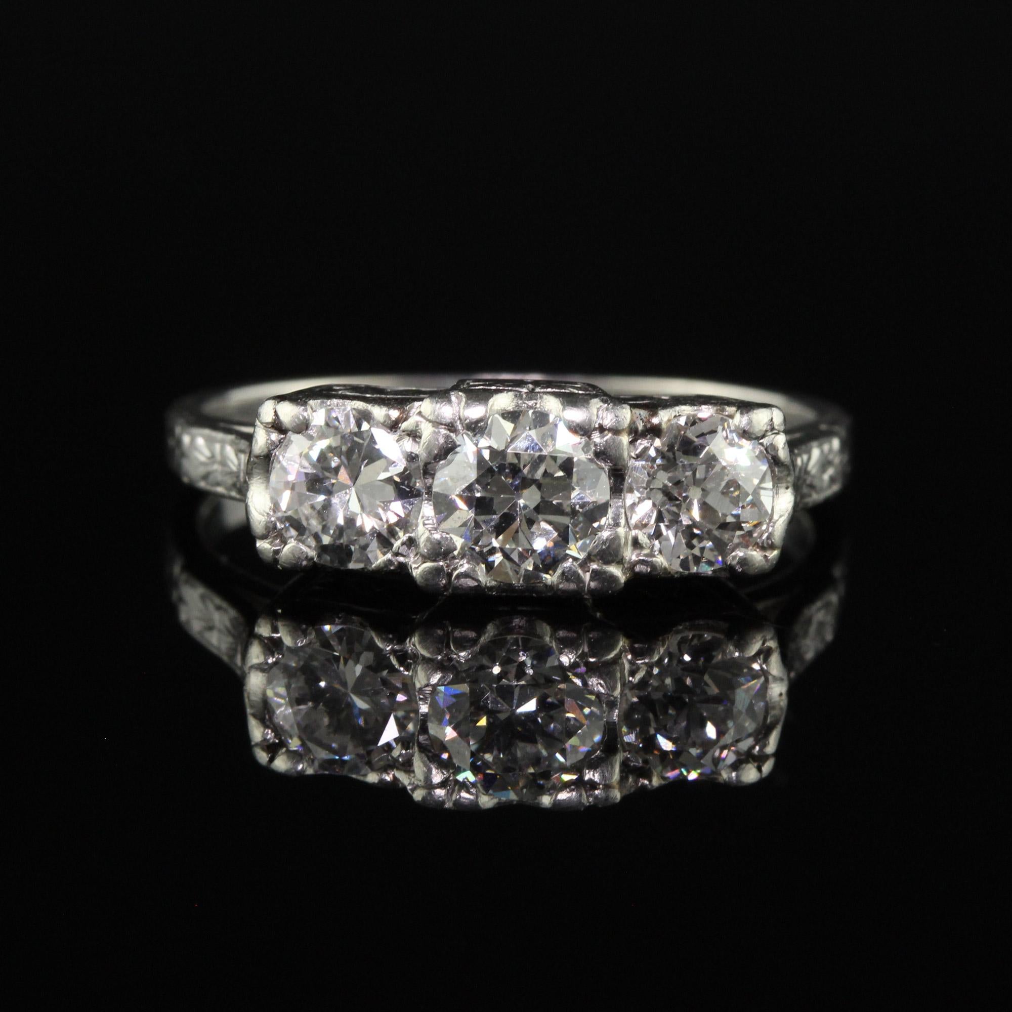 Women's Antique Art Deco Platinum Three Stone Old European Diamond Engraved Ring For Sale