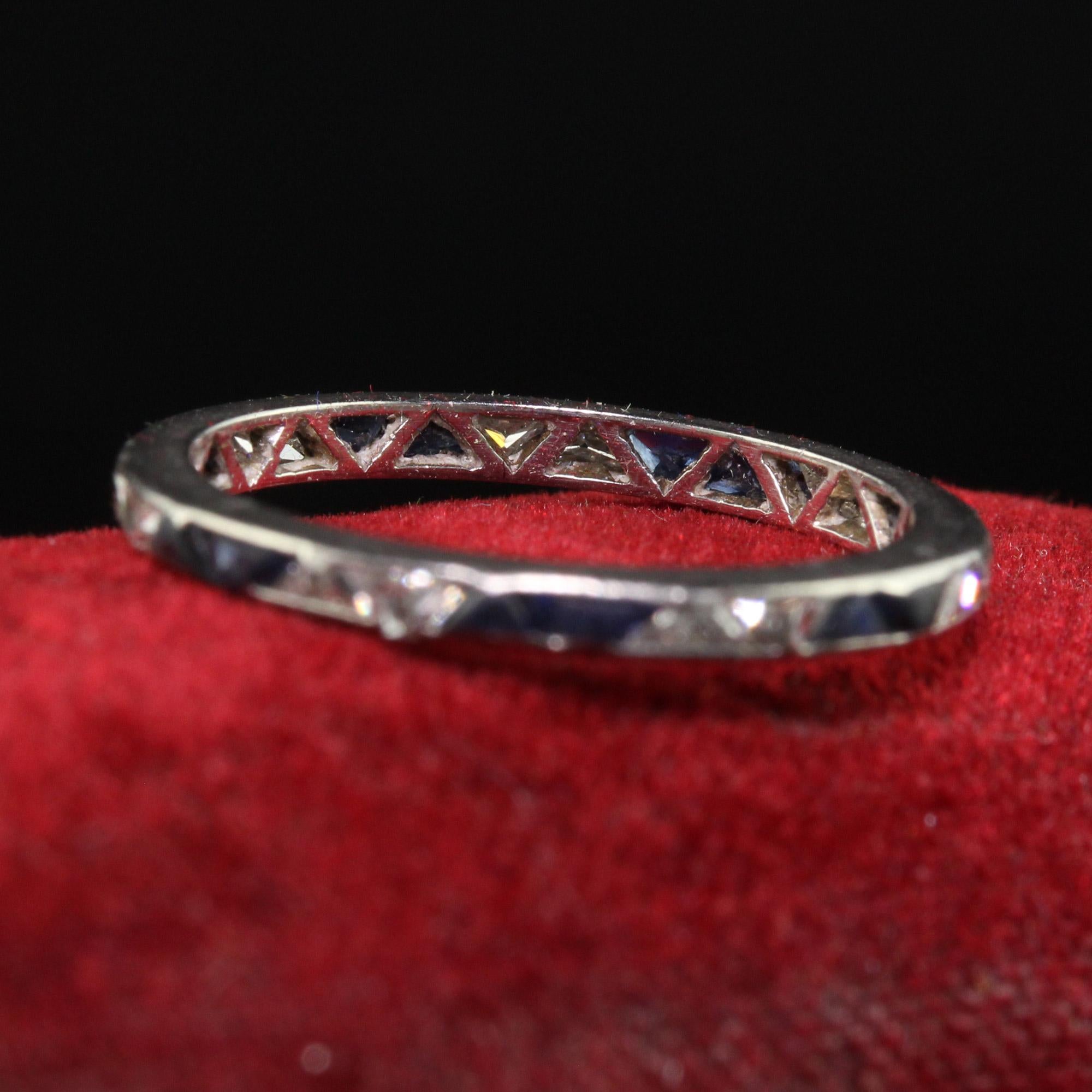 Beautiful Antique Art Deco Platinum Trillion Cut Diamond and Sapphire Eternity Band. This amazing eternity band is crafted in platinum. This band has trillion cut diamonds and sapphires alternating around the entire ring. The ring is in good