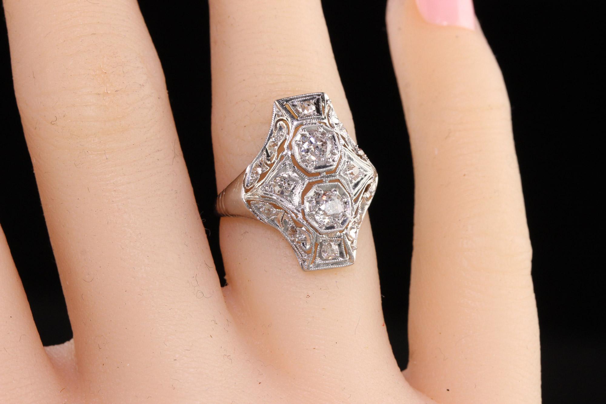 Antique Art Deco Platinum Two Stone Diamond Filigree Shield Ring In Good Condition For Sale In Great Neck, NY