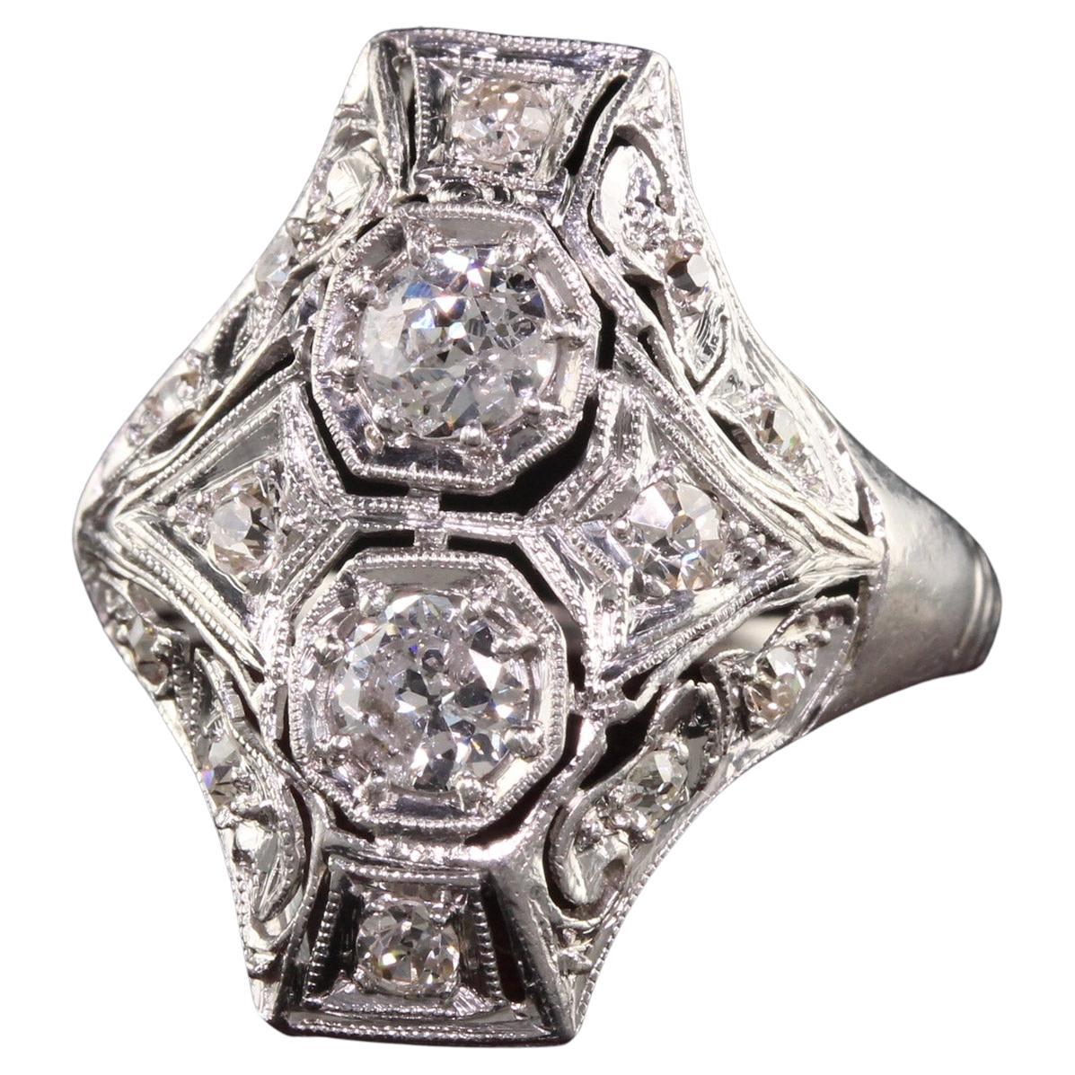 Antique Art Deco Platinum Two Stone Diamond Filigree Shield Ring For Sale