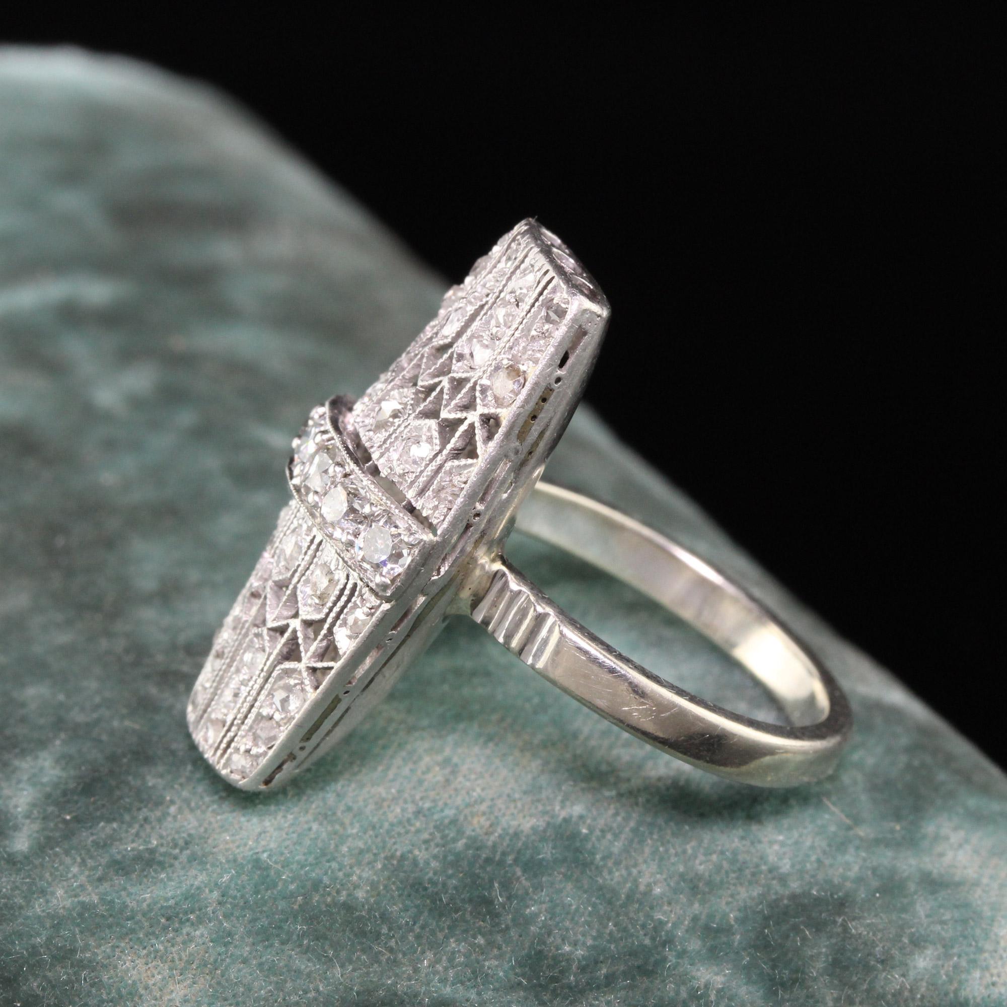 Beautiful Antique Art Deco Platinum White Gold Old Mine Rose Cut Filigree Shield Ring. This gorgeous ring has a platinum top and 14K white gold shank. The filigree and diamonds on this ring are stunning and in great condition.

Item #R0824

Metal: