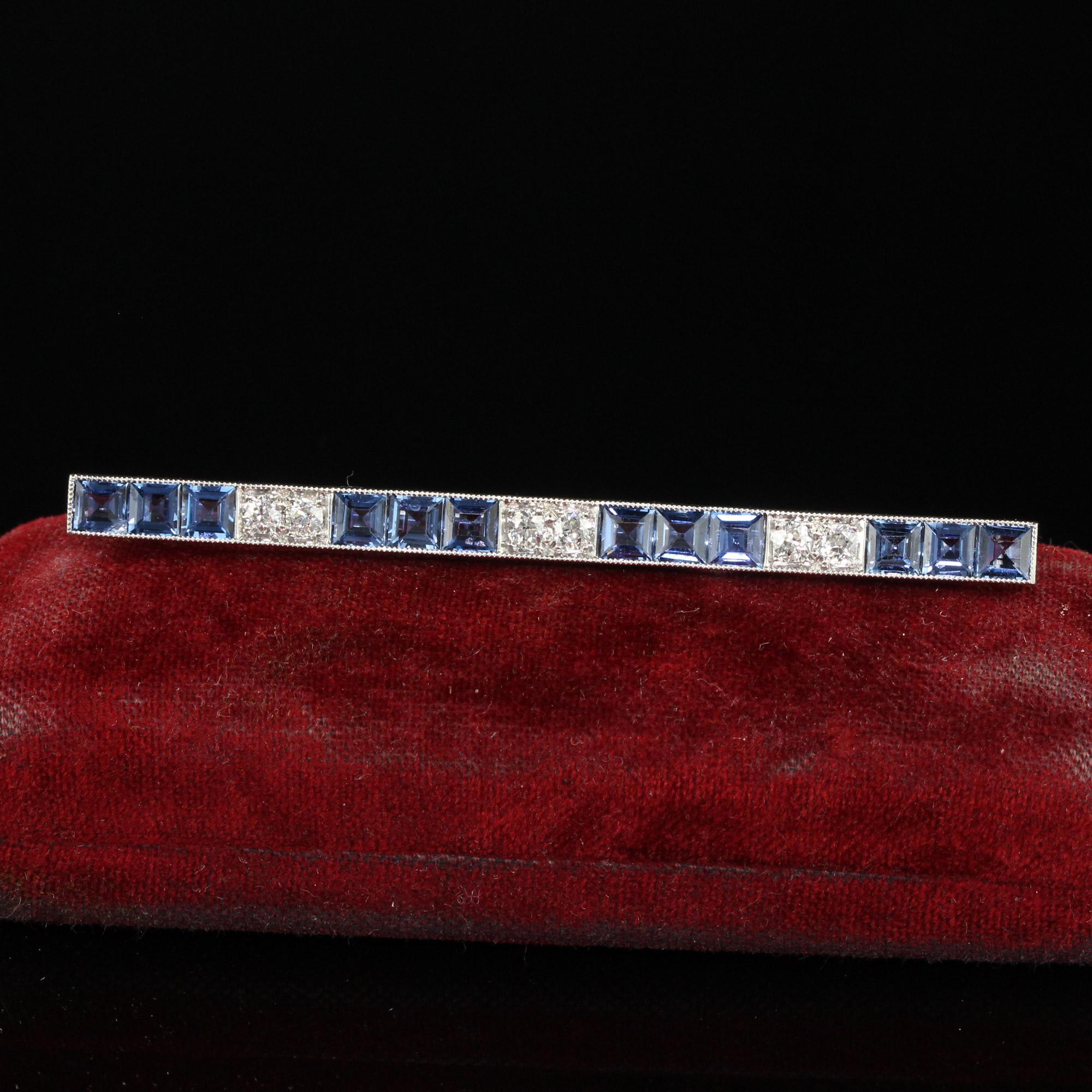Beautiful Antique Art Deco Platinum Yogo Gulch Sapphire Old Euro Diamond Bar Pin - GIA. This incredible Art Deco Yogo sapphire bar pin is crafted in platinum. The pin features twelve Carre cut sapphires and six white old European cut diamonds. The