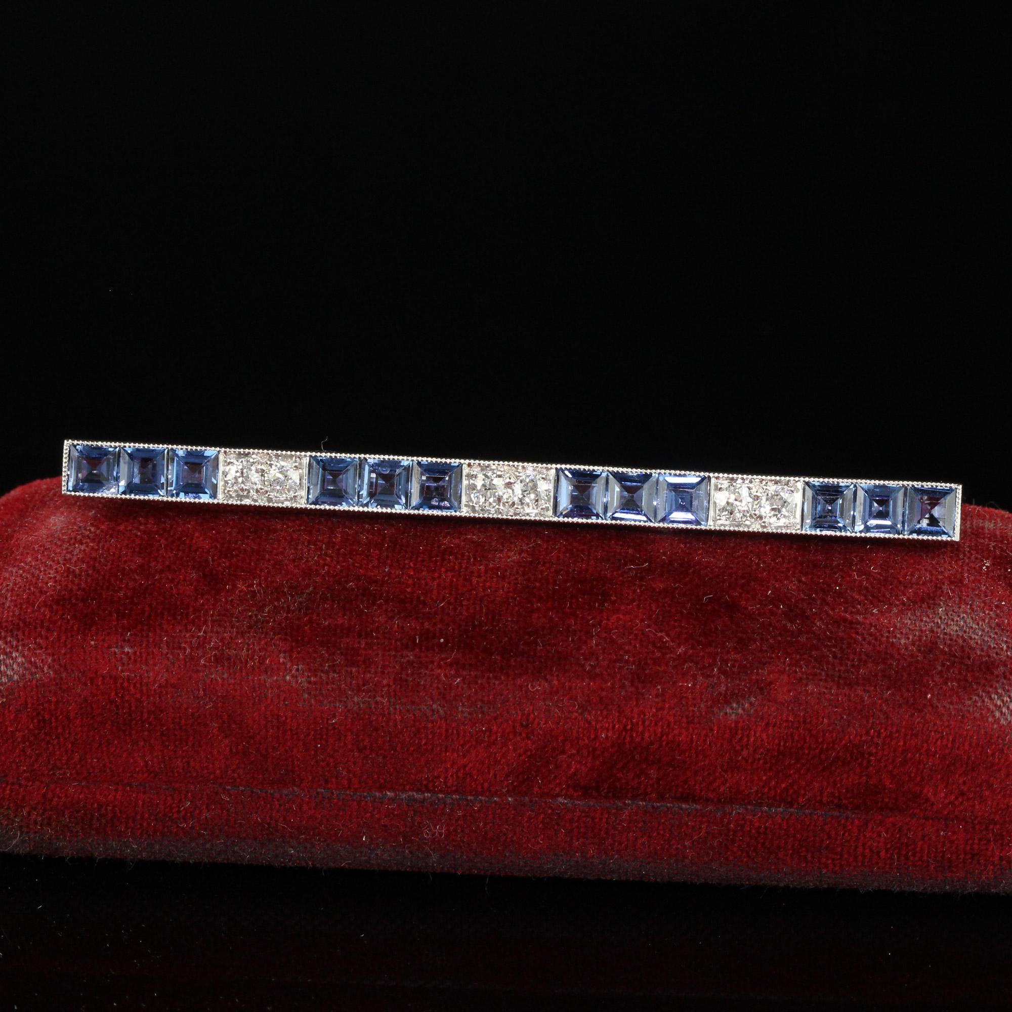 Beautiful Antique Art Deco Platinum Yogo Gulch Sapphire Old Euro Diamond Bar Pin - GIA. This incredible Art Deco Yogo sapphire bar pin is crafted in platinum. The pin features twelve Carre cut sapphires and six white old European cut diamonds. The