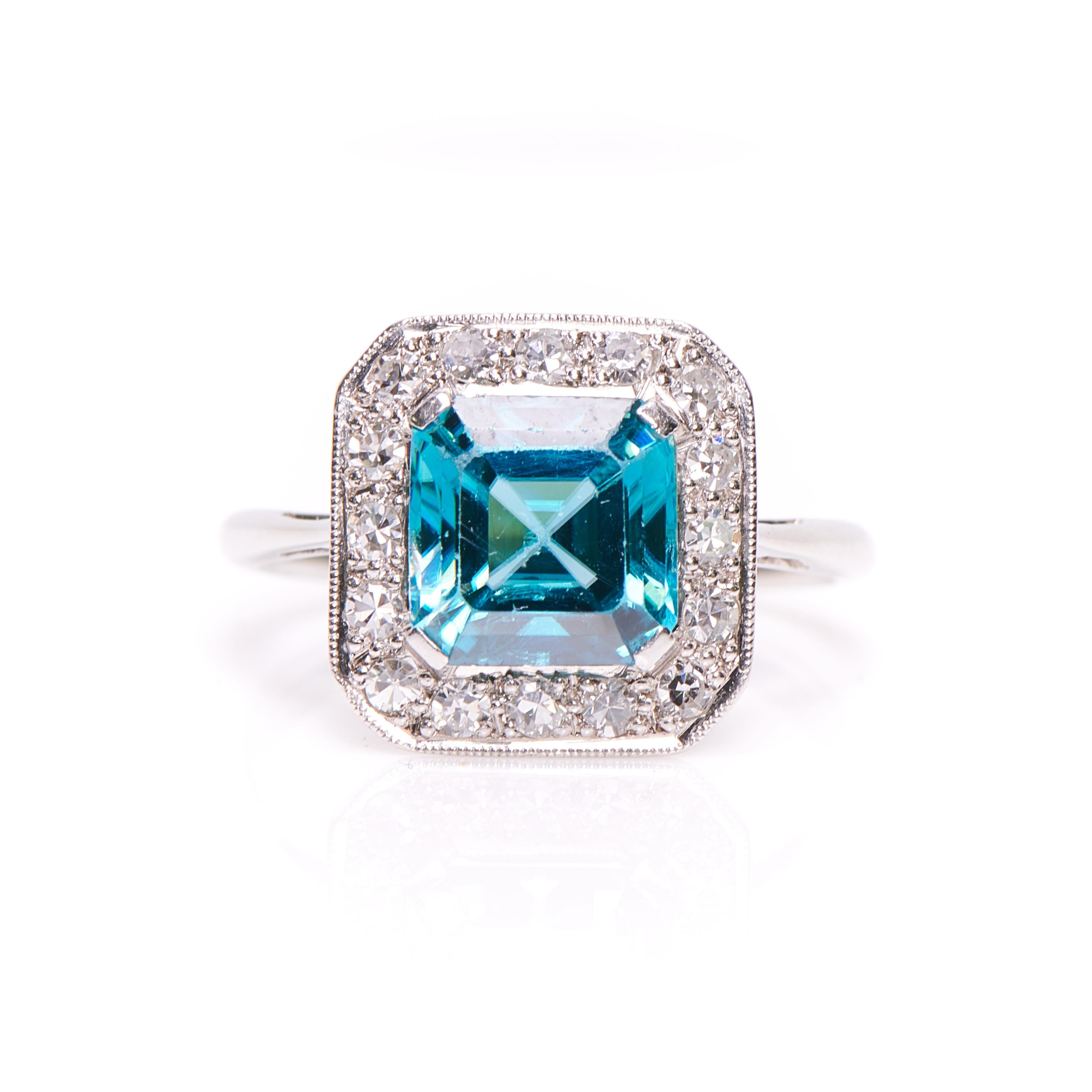 A swimming-pool blue zircon sits at the centre of this ring. Among the most fiery stones available to traditional jewellers, zircons were long regarded as second only to diamonds for their sparkling lustre and dazzling dispersion, and treasured in
