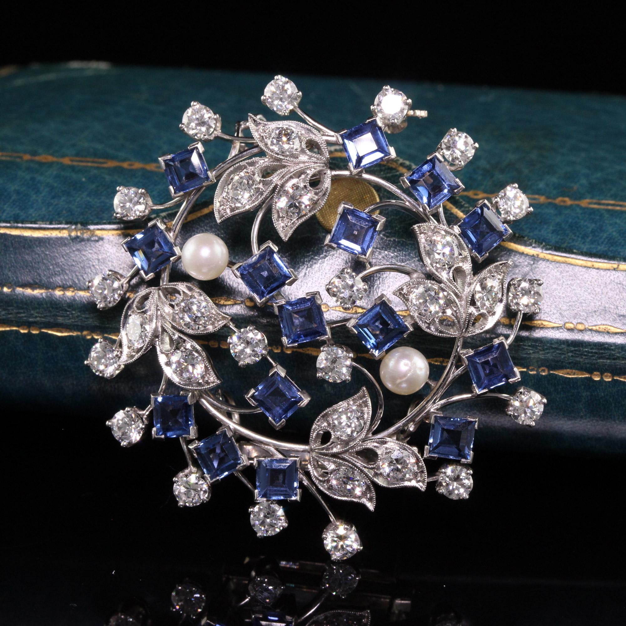 Beautiful Antique Art Deco Raymond Yard Platinum Old Cut Diamond Yogo Sapphire Pin Pendant. This incredible pin is crafted in platinum and 18K white gold. This piece has old european cut diamonds and natural yogo gulch sapphires. Yogo Gulch