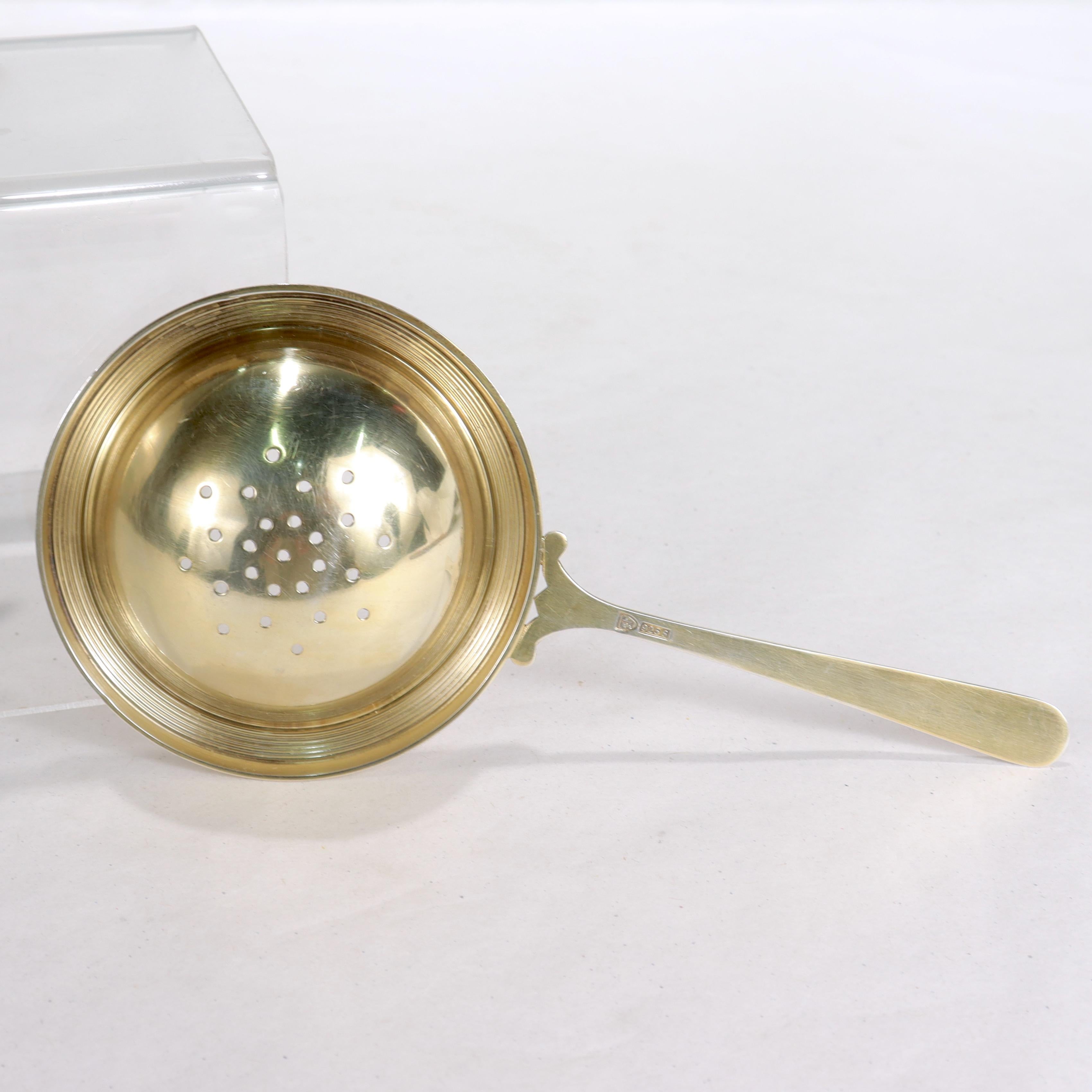 Women's or Men's Antique Art Deco Red Enamel & Gilt Sterling Silver Tea Strainer by N.M. Thune For Sale