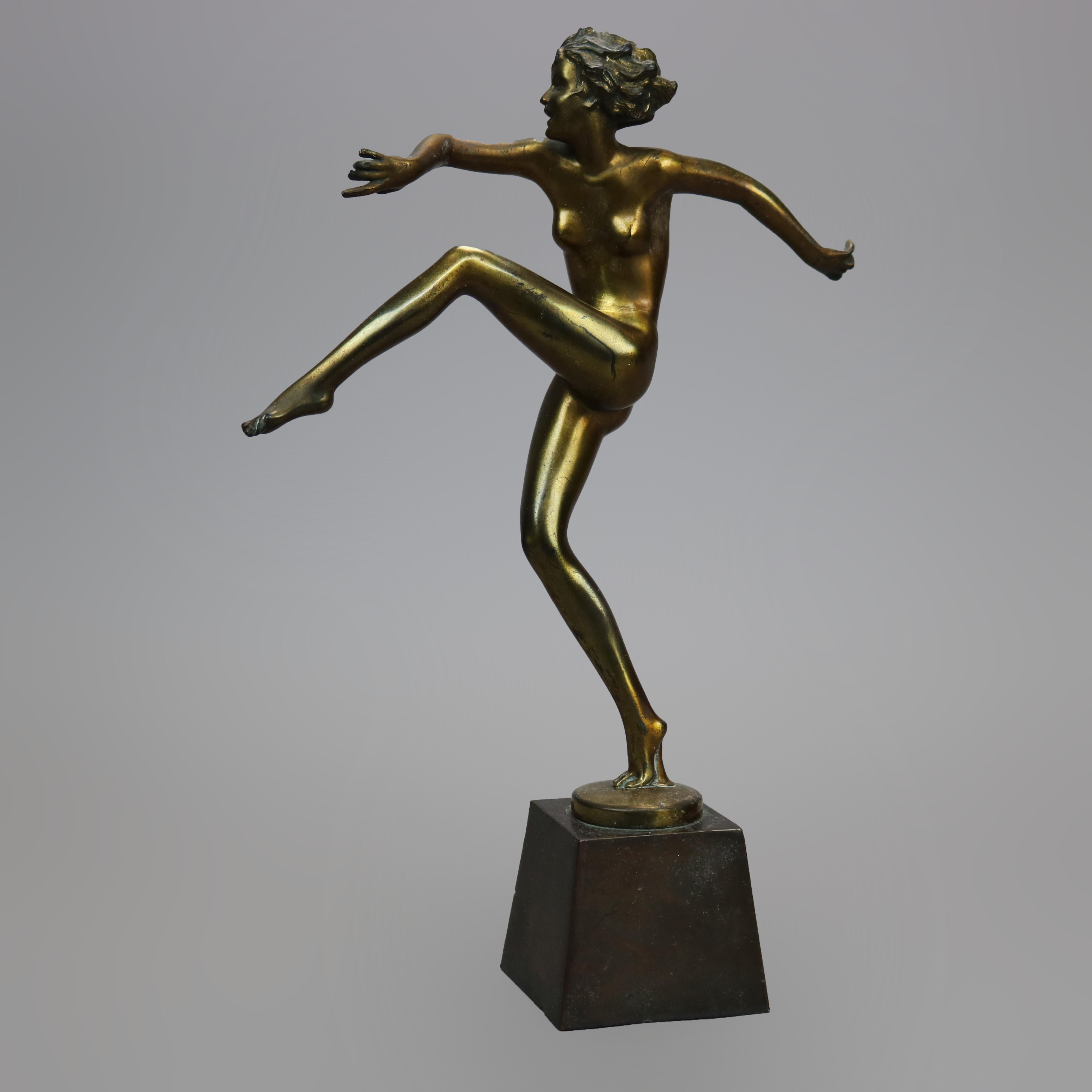 An antique Art Deco Ronson figure offers cast metal dancing nude woman on plinth, c1920

Measures - 13.75''H X 3.25''W X 9.25''D.