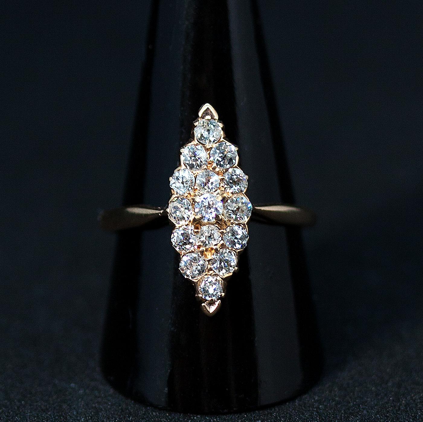 Antique navette-shaped old brilliant-cut diamond ring, fifteen old brilliant-cut diamonds in a cluster, all diamonds estimated to 
weigh a total of 0.75 carats, claw set in a rose gold mount.
 
Austria, circa 1920

head measuring  2.0 x 0.8 cm  / 