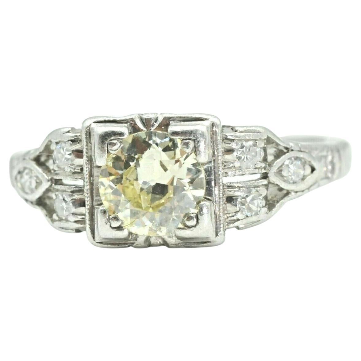 Blue Tourmaline Oval and White Diamond Engagement Ring in Platinum For