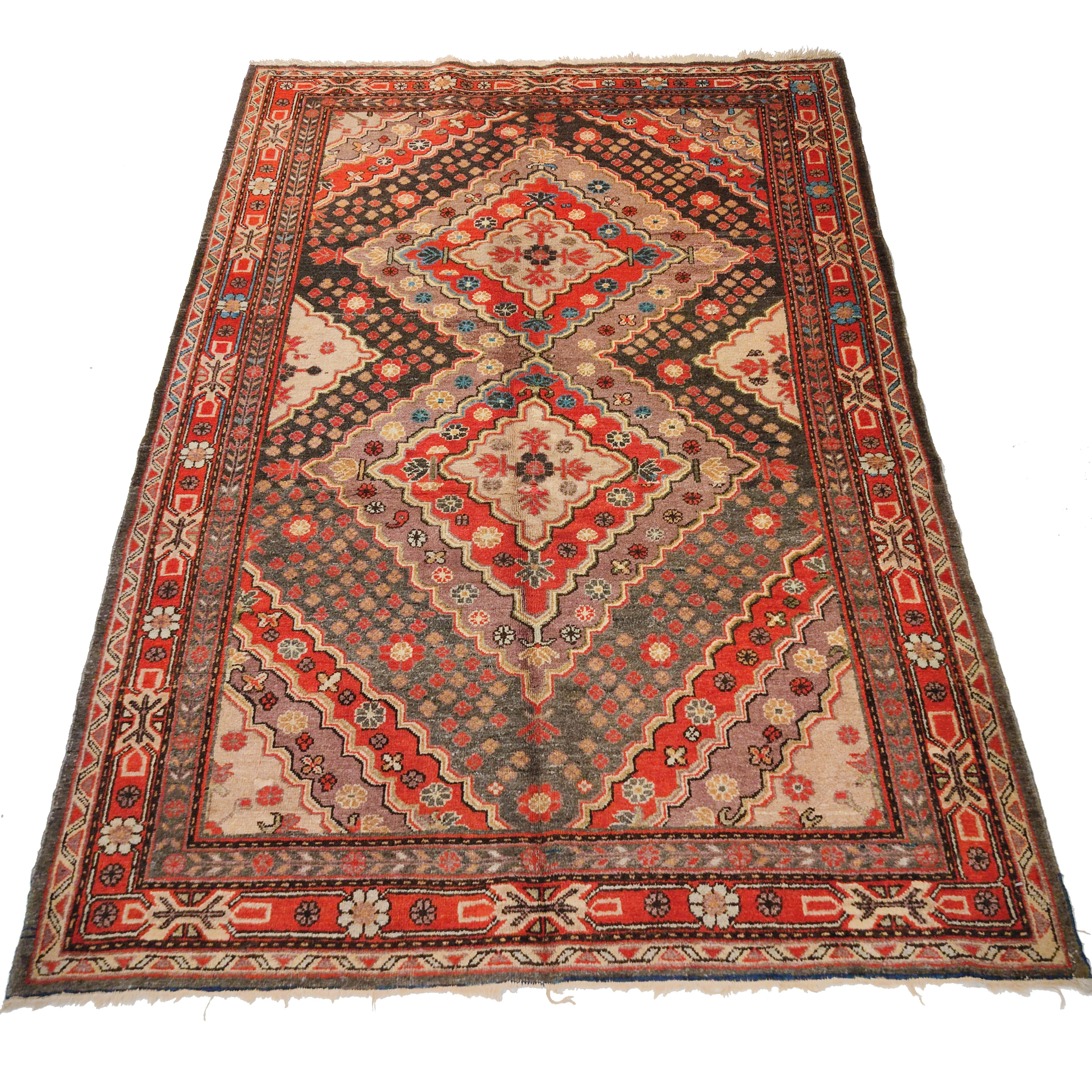 Woven during the Art Deco period, rugs of this type were commissioned by the nobility and the high ranking officers inhabiting the Tarim Basin in eastern Turkestan, which is the heartland of the oasis of Khotan, Yarkand and Kashgar. The rugs of
