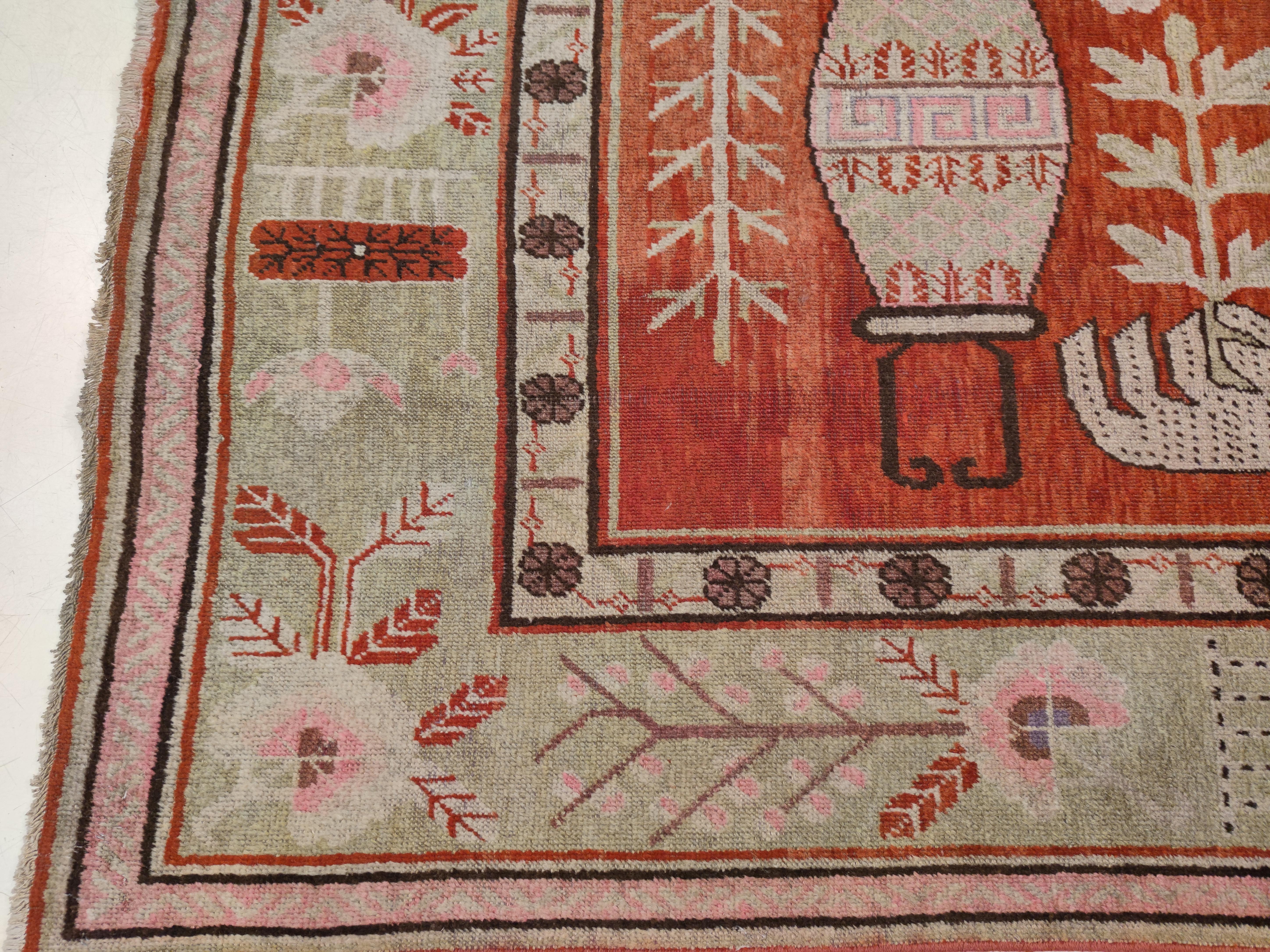 Woven during the Art Deco period, rugs of this type were commissioned by the nobility and the high ranking officers inhabiting the Tarim Basin in eastern Turkestan, which is the heartland of the oasis of Khotan, Yarkand and Kashgar. The rugs of