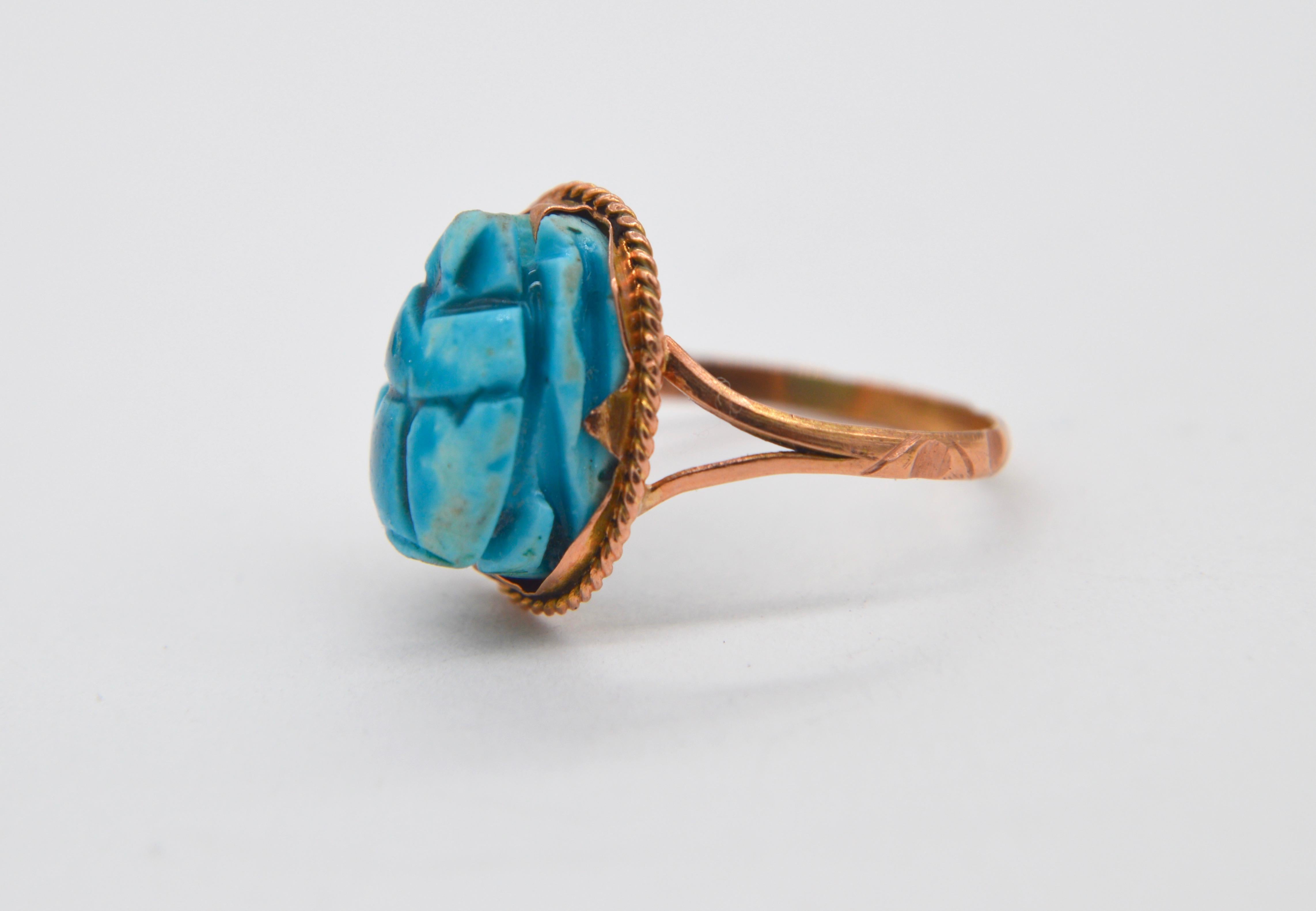 Beautiful Art Deco era circa 1920s antique faience turquoise glazed scarab beetle ring. Solid 18K rose gold setting. Ring has been tested as 18K. Has hieroglyphics stamped inside shank as pictured, The faience could be an original artifact from the