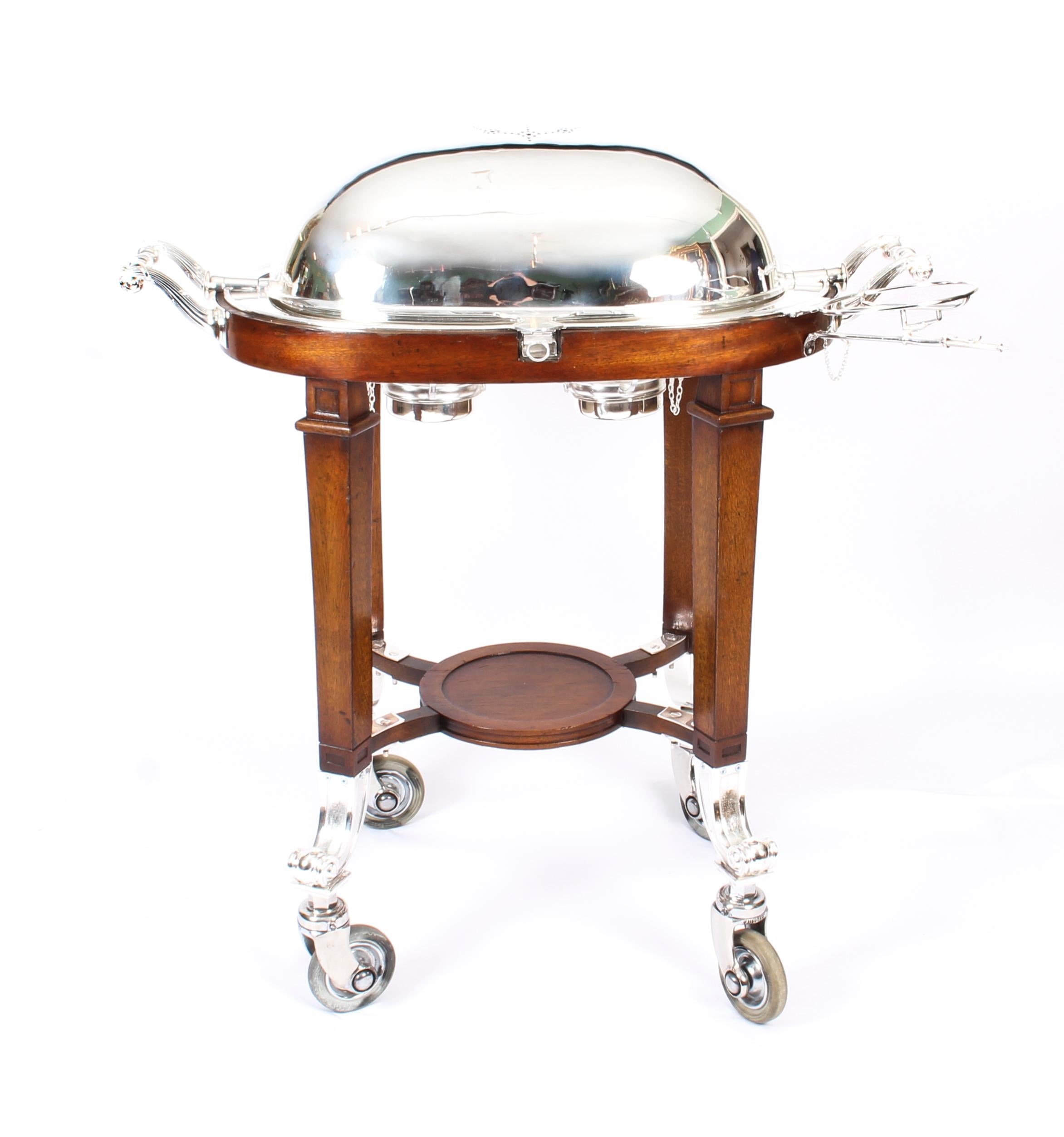 A magnificent and rare fully restored antique Art Deco silver plate and mahogany beef trolley serving cart, circa 1930 in date.

This stunning trolley is suitable for serving cooked meats such as roast beef, lamb, and turkey.
 
It features a