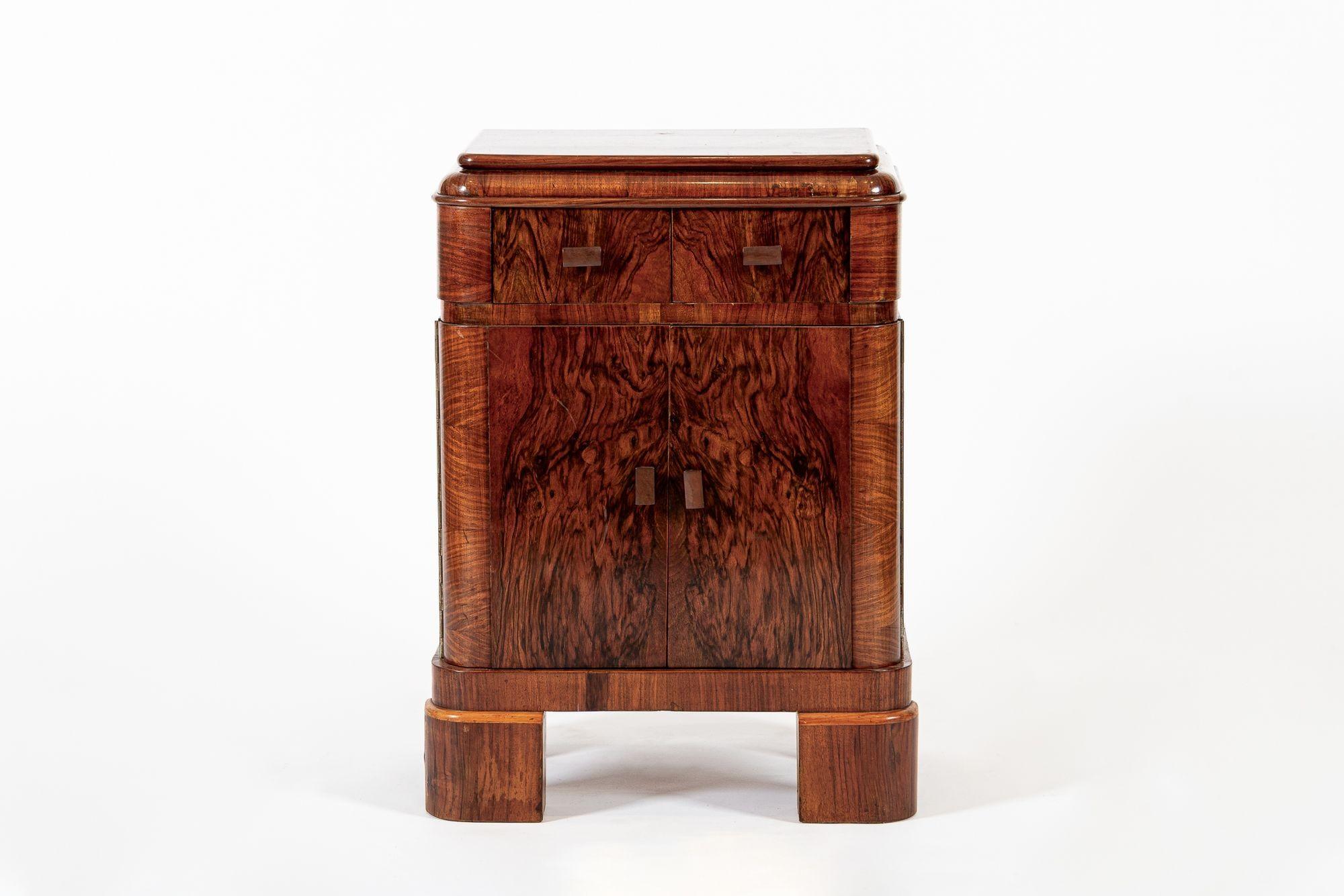 This exceptional antique Art Deco lacquered wood small side cabinet or nightstand is circa 1940. This unique, handcrafted, burl wood cabinet is solidly constructed and has classic Art Deco styling with clean lines, gentle curves. The distinctive