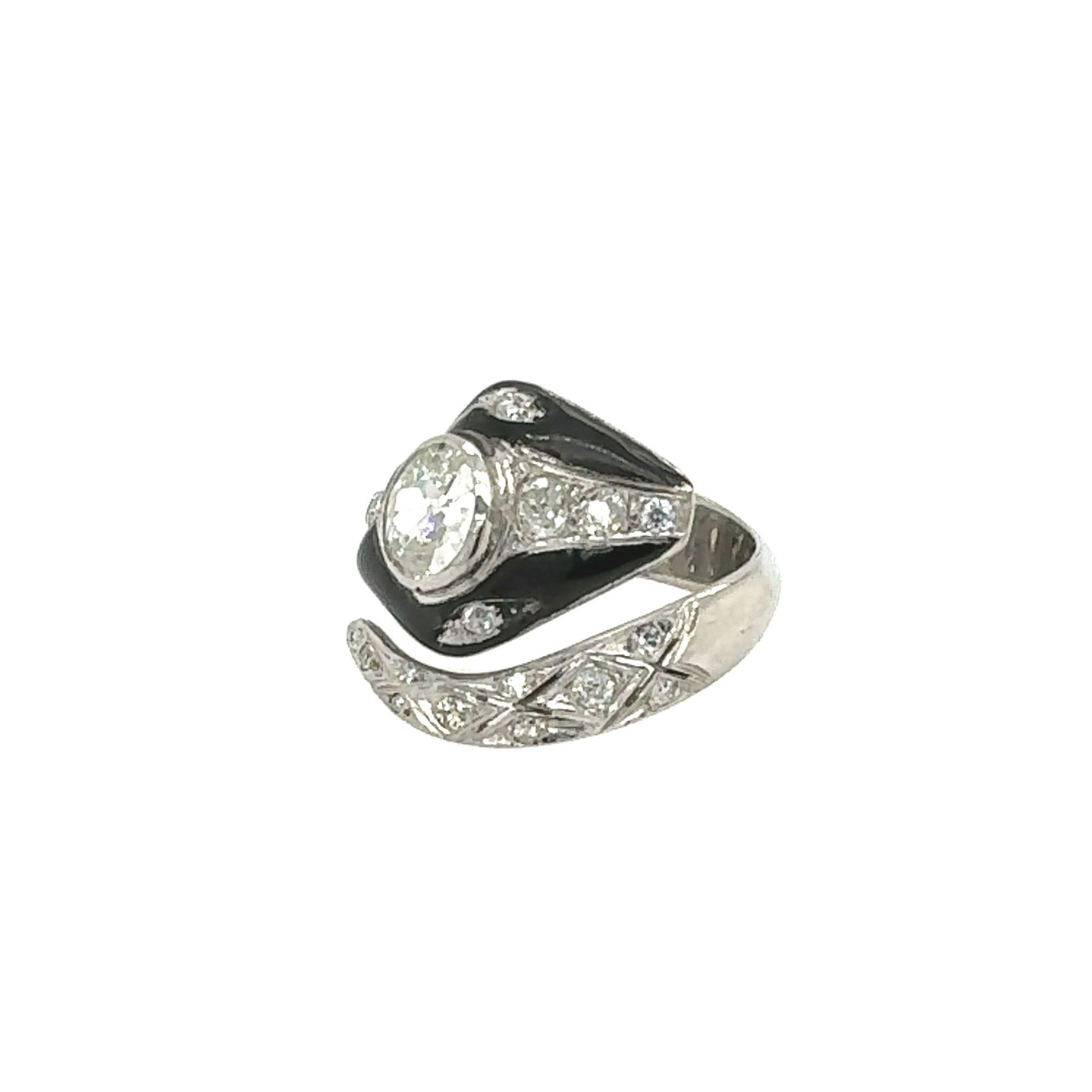 Add a touch of whimsy to your jewelry collection with this Antique Art Deco Snake Ring. Crafted in platinum and accented with sparkling diamonds and bold black enamel, this cool piece is perfect for the unconventional fashionista. Watch out, this