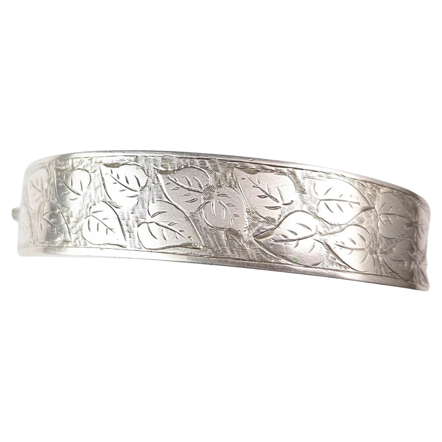 Antique, Art Deco sterling silver bangle, leaf engraved  For Sale