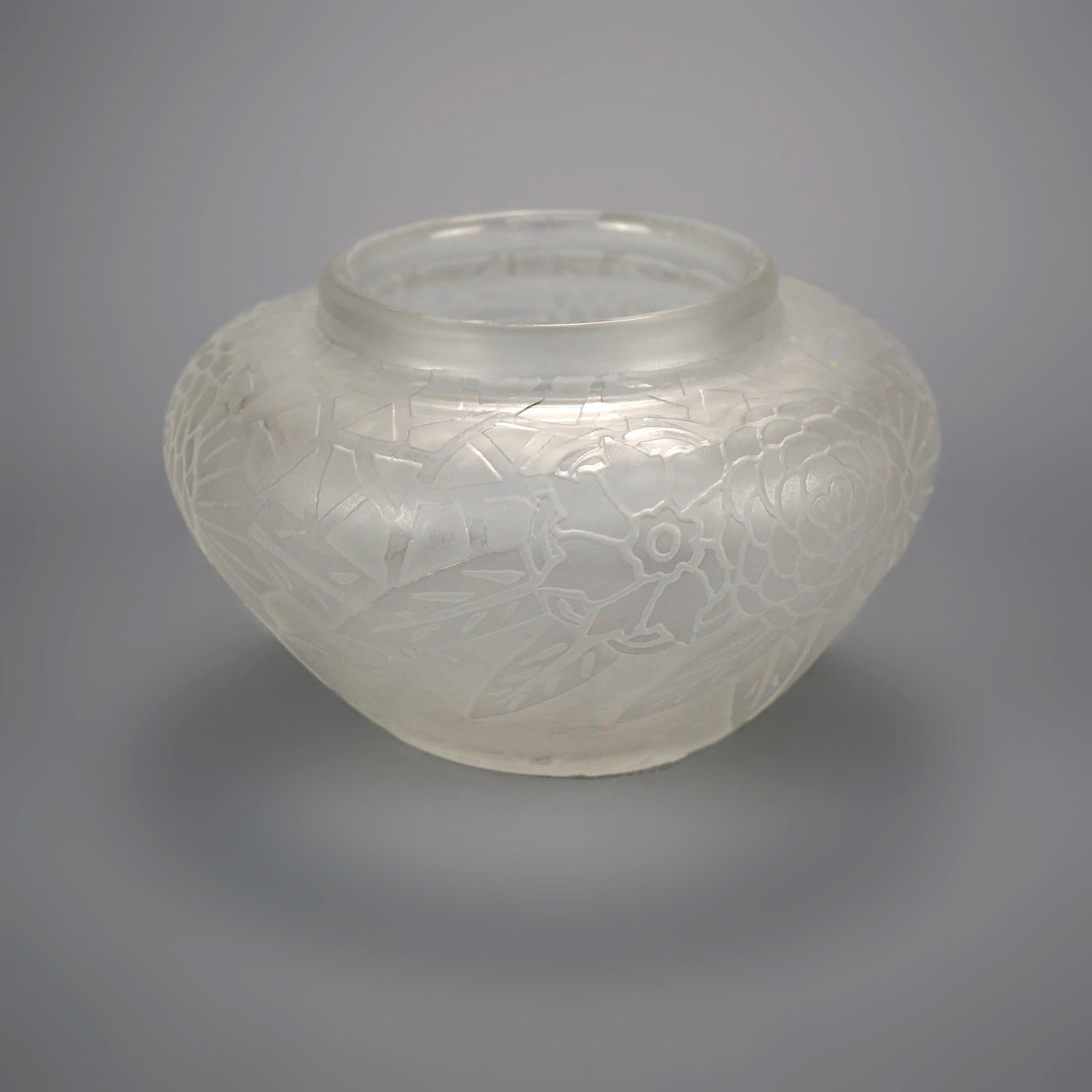 An antique Art Deco squat vase by Steuben offers art glass construction with acid cutback stylized floral design, maker signed as photographed, circa 1920

Measures- 4.75'' H x 7.75'' W x 7.75'' D.