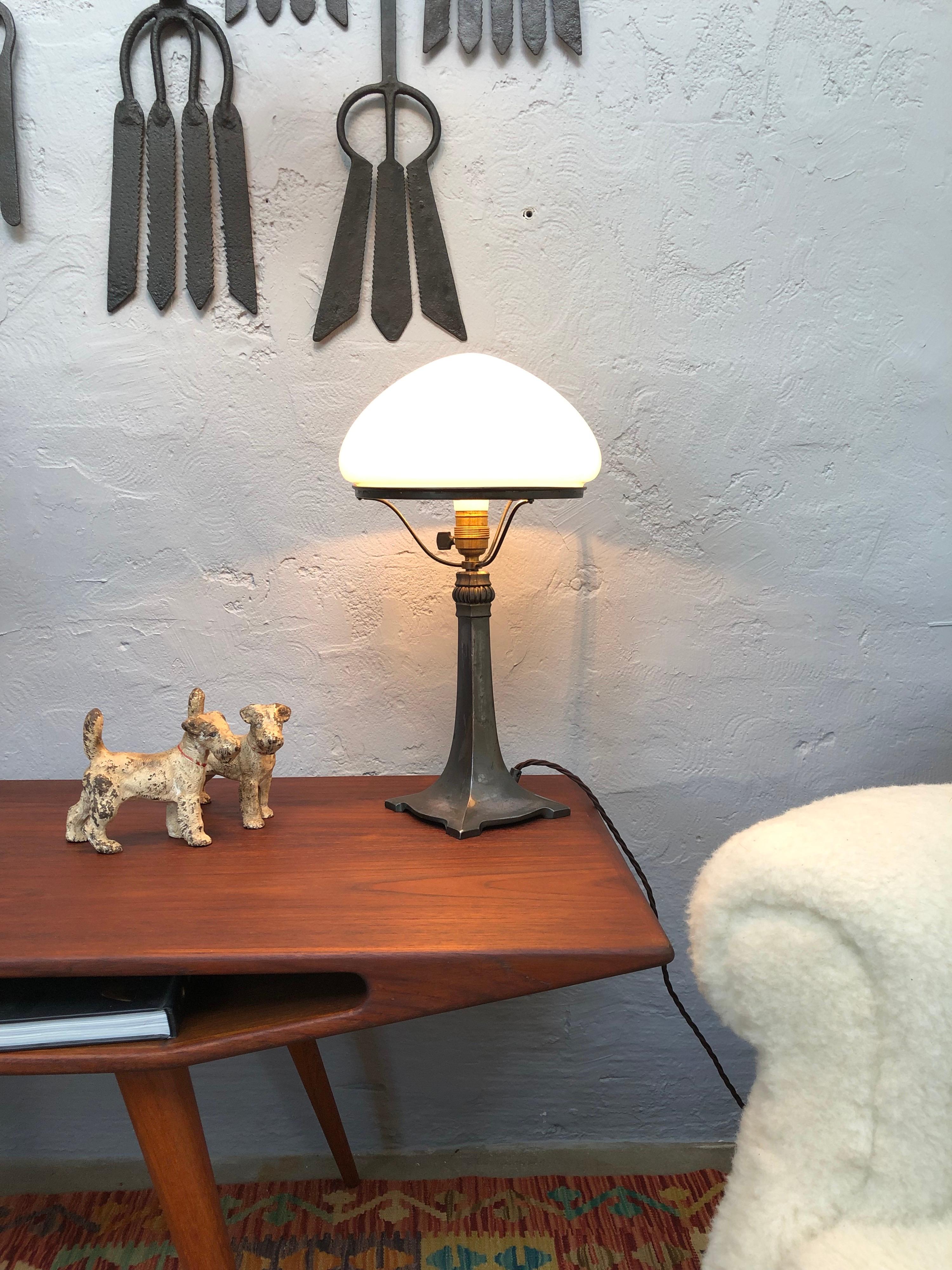 Danish Antique Art Deco Table Lamp in Cast Alloy with an Opaline Blown Glass Shade