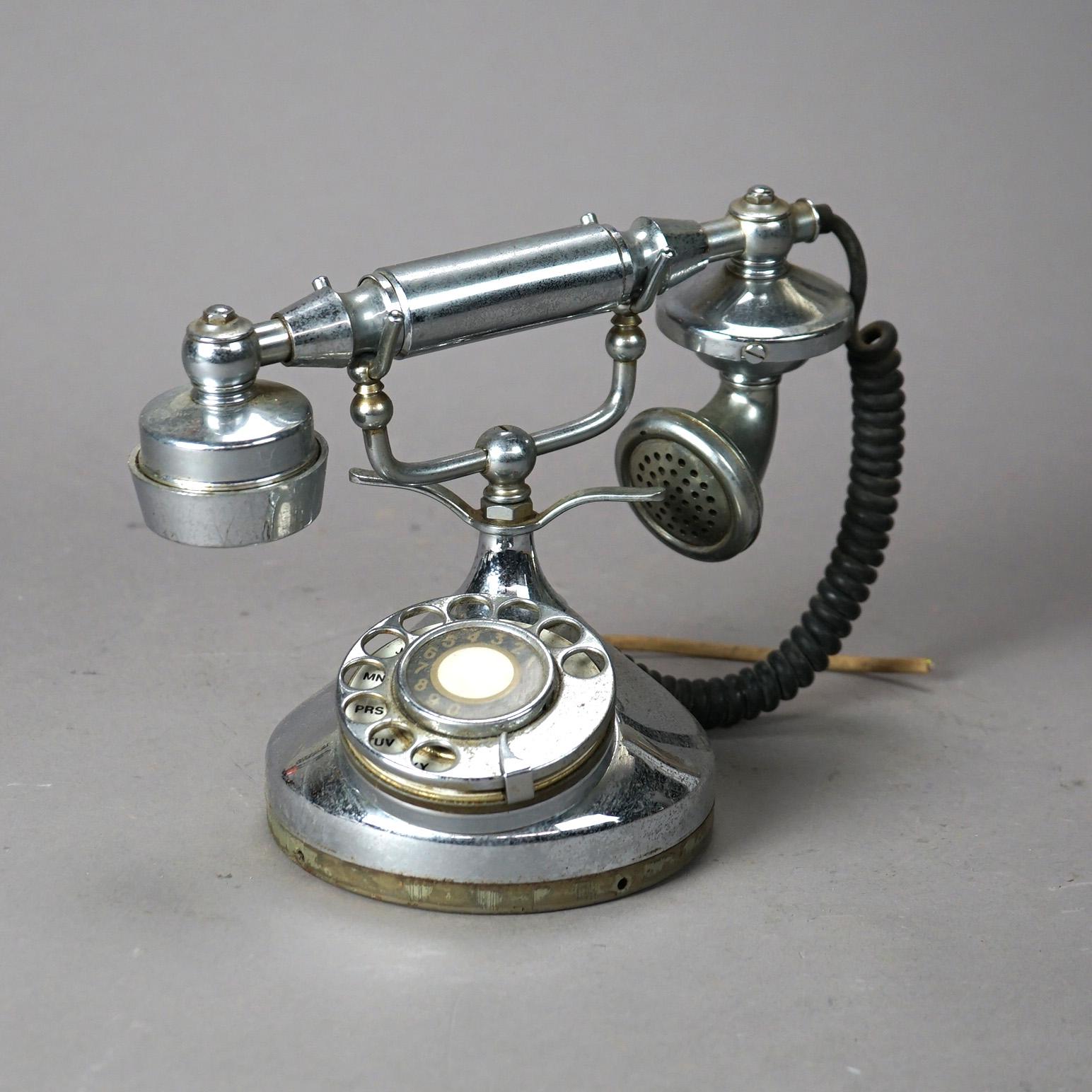 An antique Art Deco rotary telephone circa 1930

Measures - 7.5
