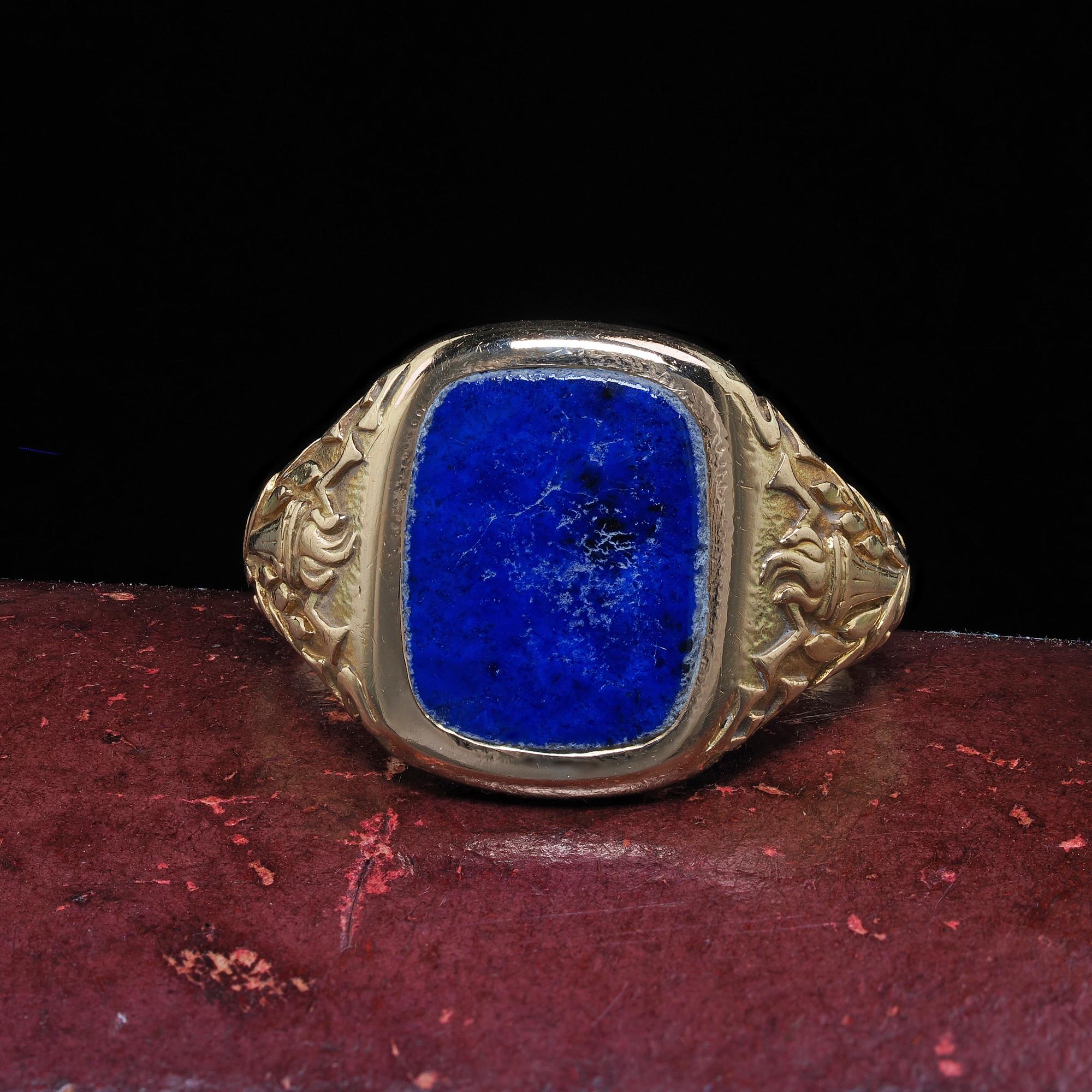 Beautiful Antique Art Deco Tiffany and Co 14K Yellow Gold Lapis Engraved Ring. This beautiful Art Deco Tiffany and Co ring is crafted in 14k yellow gold. The center of the ring features a natural Lapis stone with a gorgeous blue color and is set in