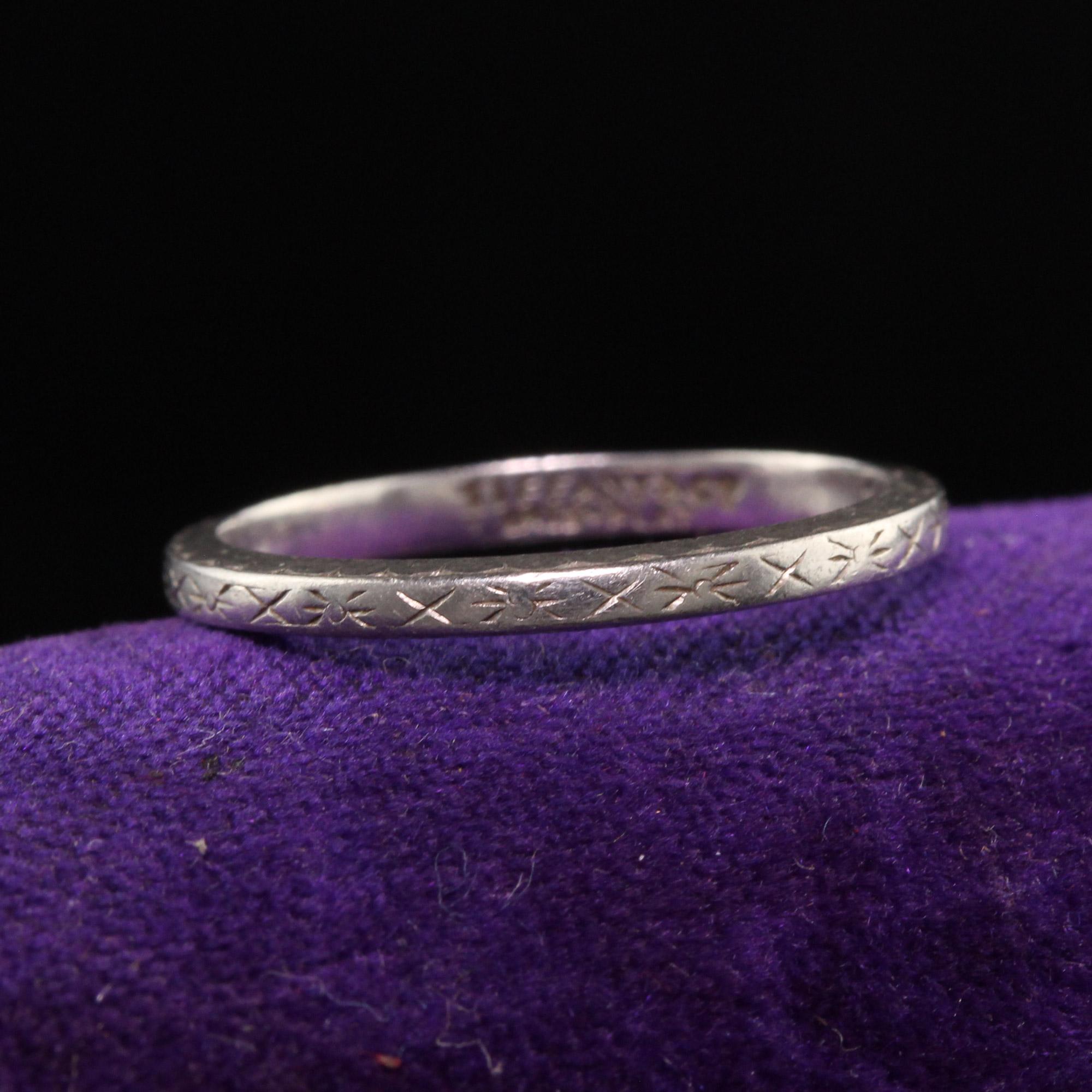 Beautiful Antique Art Deco Tiffany and Co Platinum Engraved Wedding Band - Size 5. This classic wedding band has engravings on the top and is engraved 