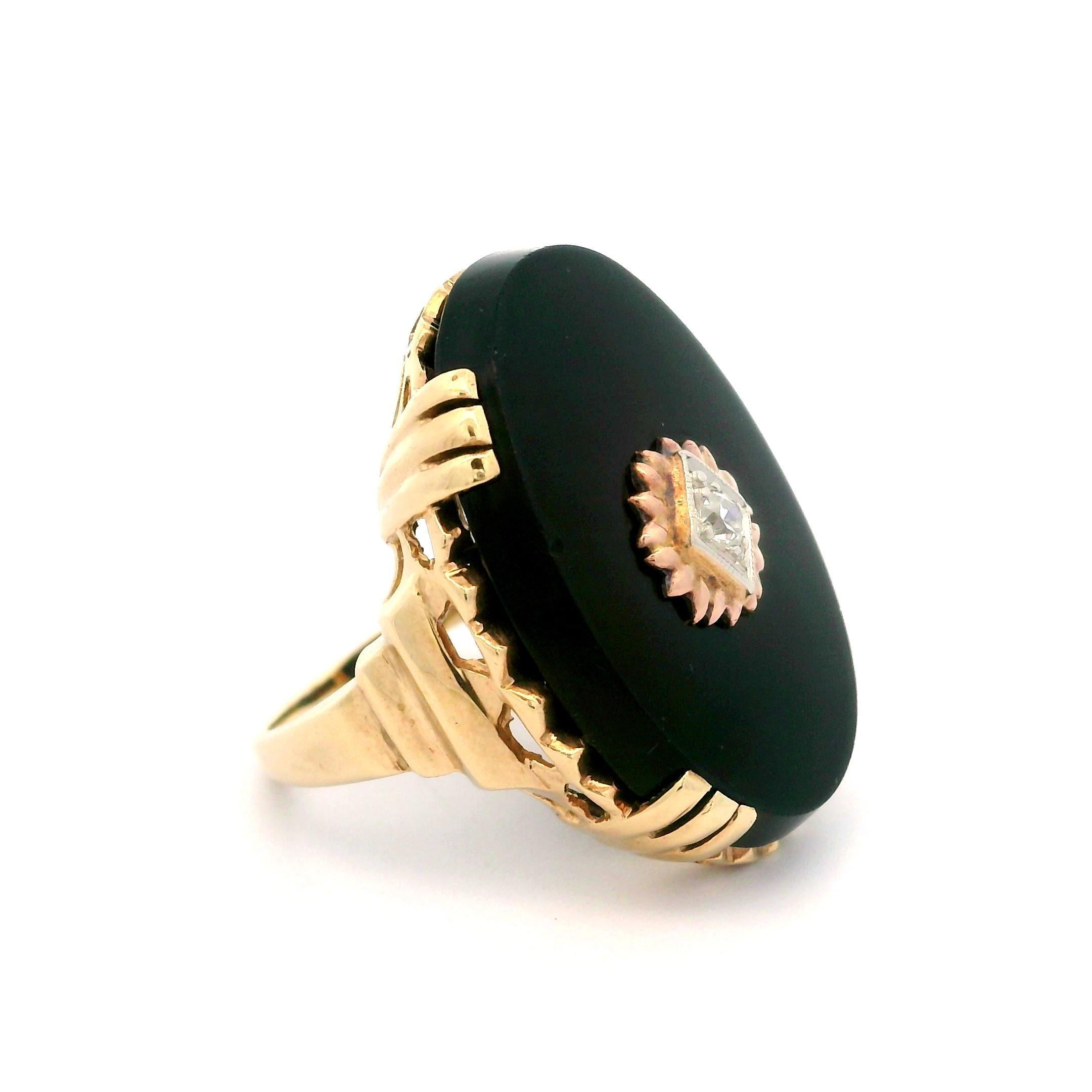 –Stone(s)–
(1) Natural Genuine Diamond - Old European Cut - Pave Set - White Color - 0.04ct (approx.)
(1) Natural Genuine Onyx - Oval Cut - Prong Set - Black Color - 25.2x18.1mm (approx.)

Material: 10k Yellow Gold 
Weight: 7.51 Grams
Ring Size: 6.0