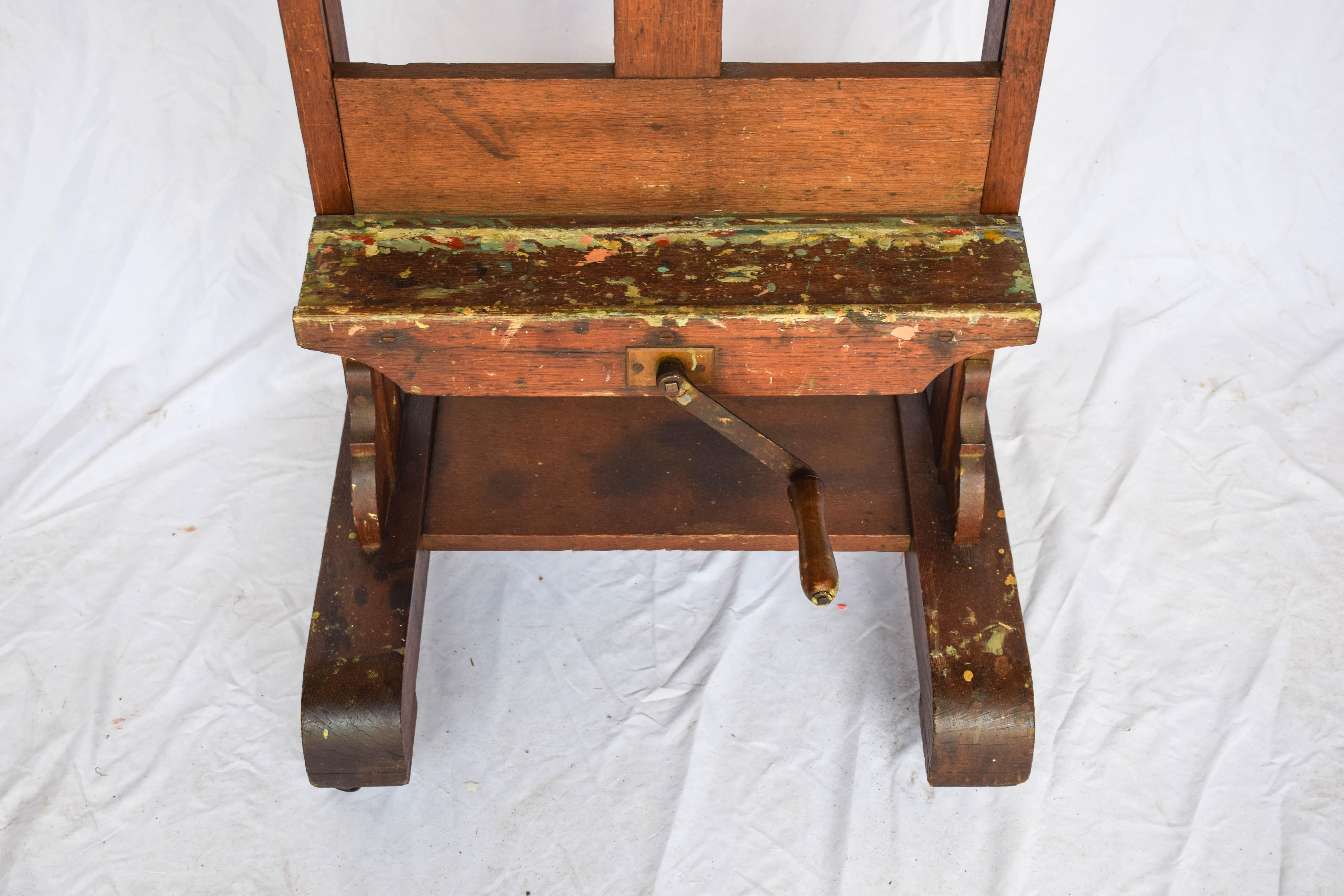 Vintage Artist's Easel. This easel is a versatile piece and can be used for it's intended purpose, as an easel, or to display a work of art, or hold a flat screen television. The easel retains it's wonderful original patina and is full of dried