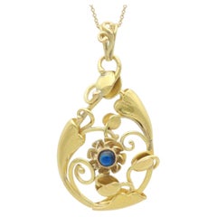 Antique Art Nouveau 0.36 Carat Sapphire and 14k Yellow Gold Pendant Circa 1900