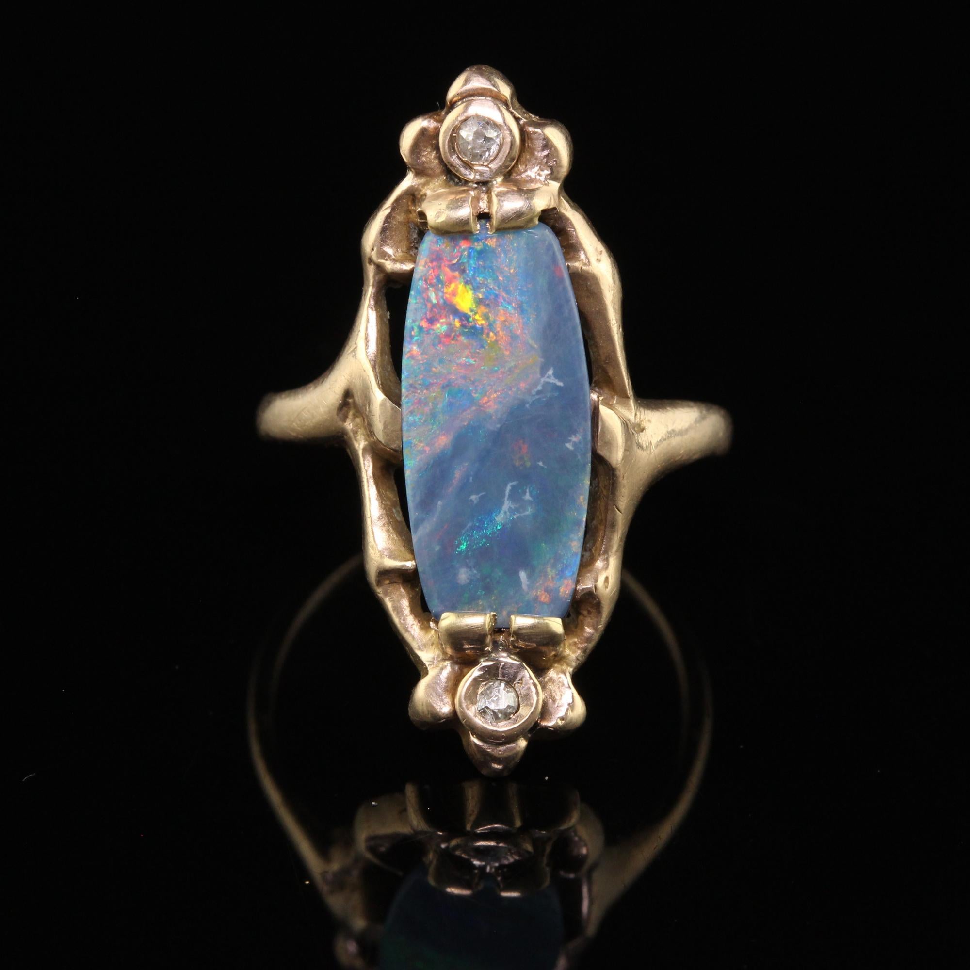 Antique Art Nouveau 10K Rose Gold Boulder Opal and Diamond Floral Ring In Good Condition For Sale In Great Neck, NY