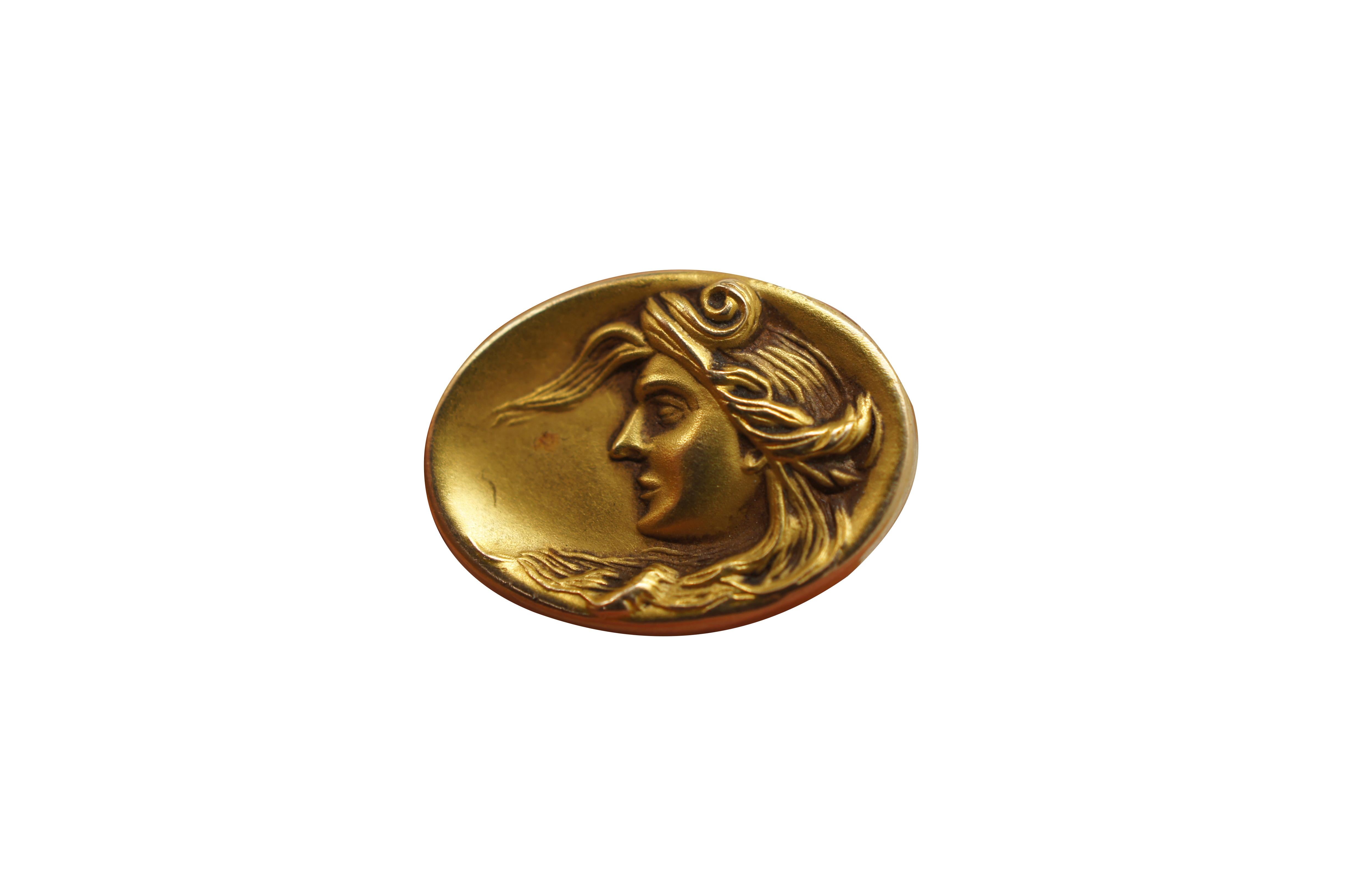 Antike Manschettenknöpfe im Jugendstil aus 10-karätigem Gold in ovaler Form mit weiblicher Silhouette.

Abmessungen: 
0,625