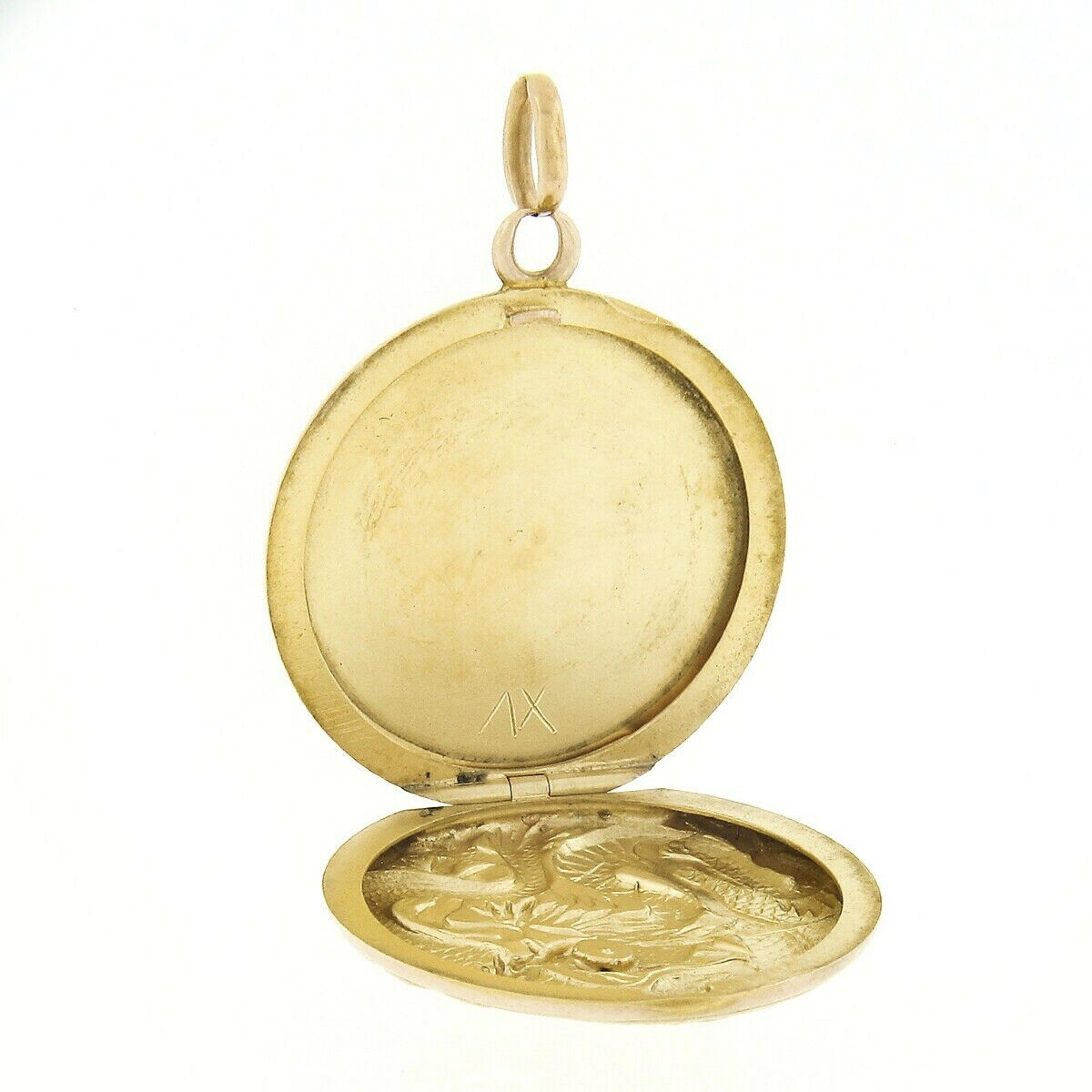 Antique Art Nouveau 14k Gold Detailed Dragon Repousse Medallion Locket Pendant In Good Condition In Montclair, NJ
