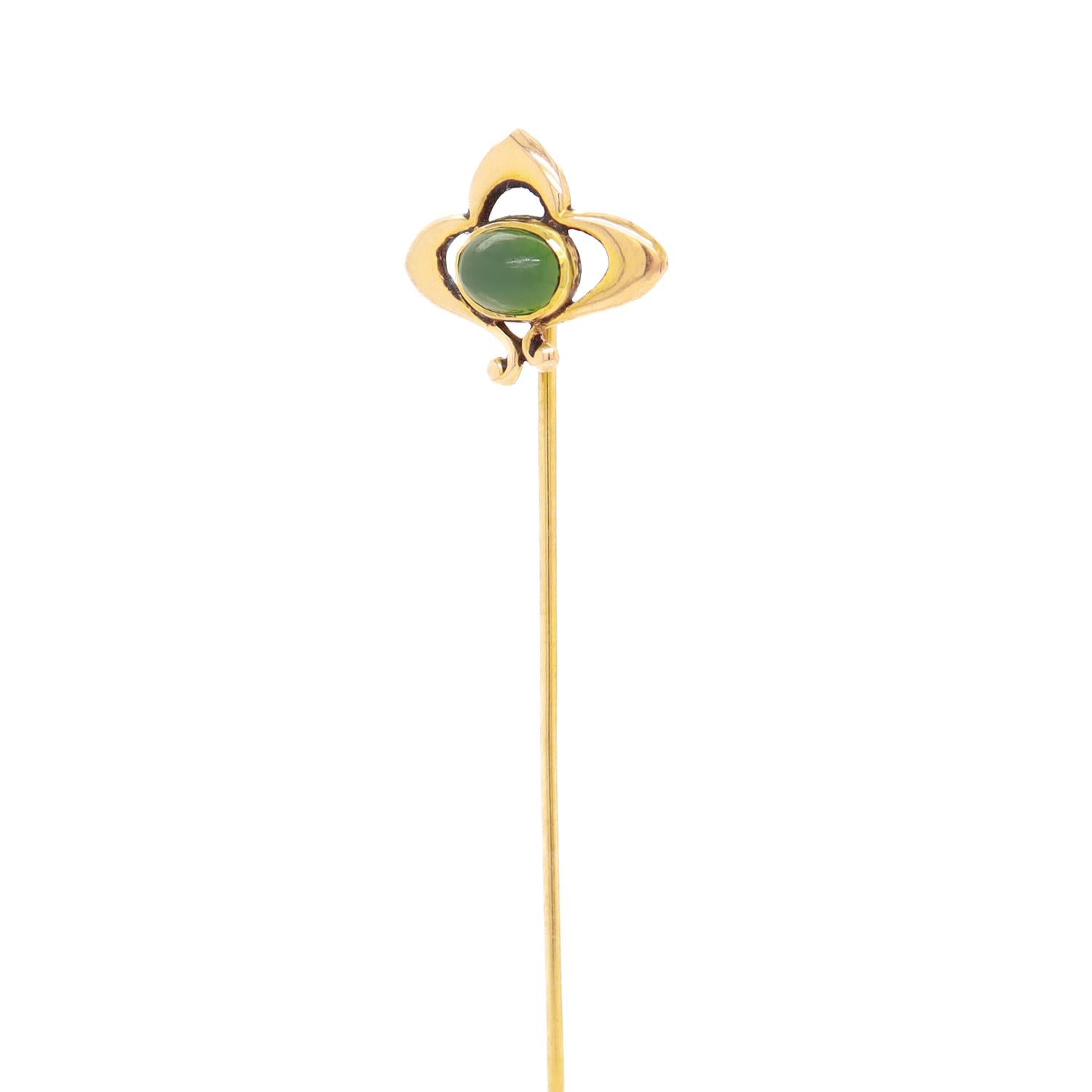 A fine antique stickpin.

In 14 karat yellow gold.

Bezel-set with a jade green colored glass cabochon to the center of an Art Nouveau setting.

Signed to the reverse.

Simply a wonderful antique stickpin!

Date:
Early 20th Century

Overall