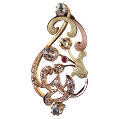 Broche ancienne Art Nouveau en or jaune 14K sertie de diamants taillés en rose et de rubis