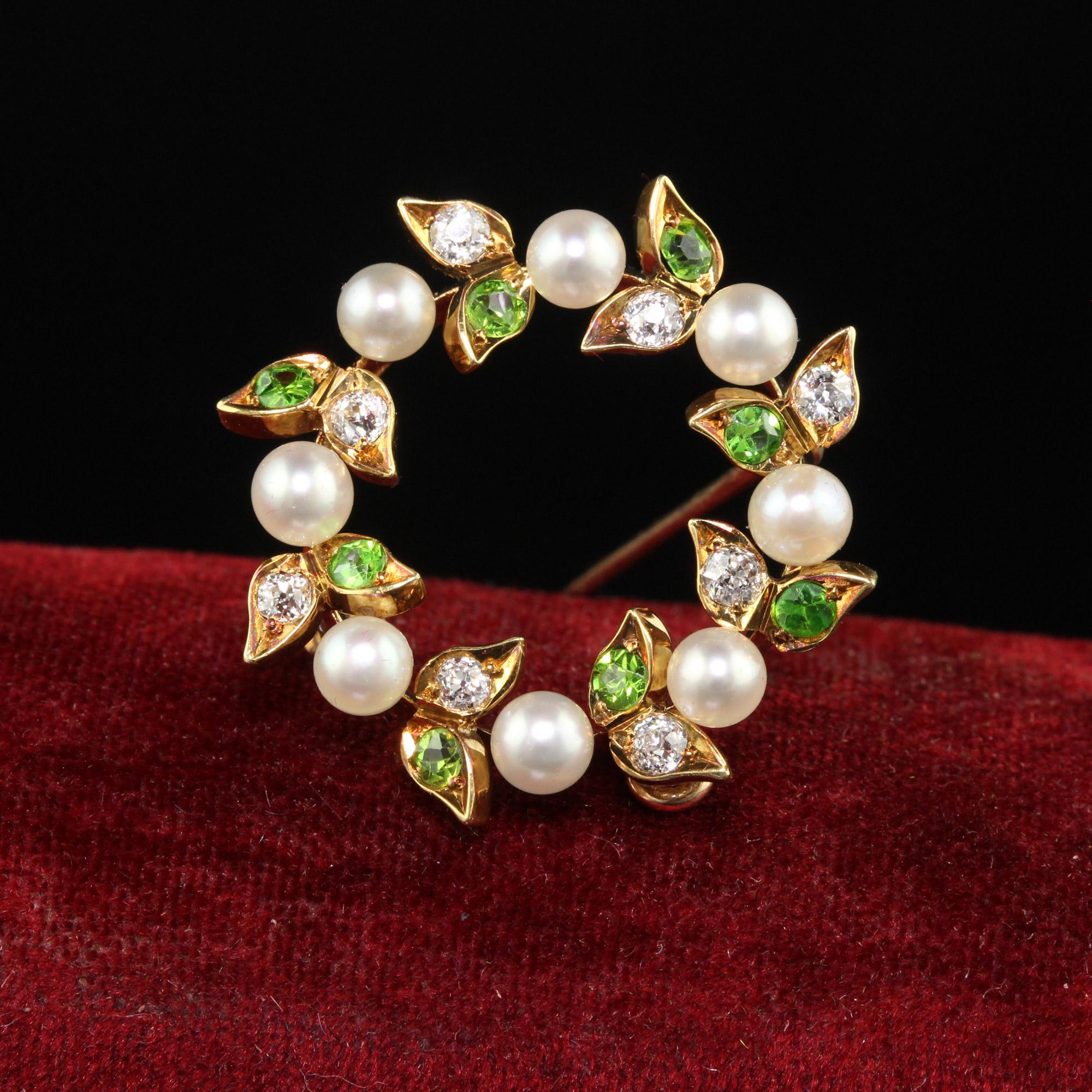 Beautiful Antique Art Nouveau 18K Yellow Gold Demantoid Garnet Diamond and Pearl Pin Pendant. This beautiful pin and pendant is crafted in 18k yellow gold. The pin has gorgeous green demantoid garnets, old mine diamonds, and pearls set in a wreath