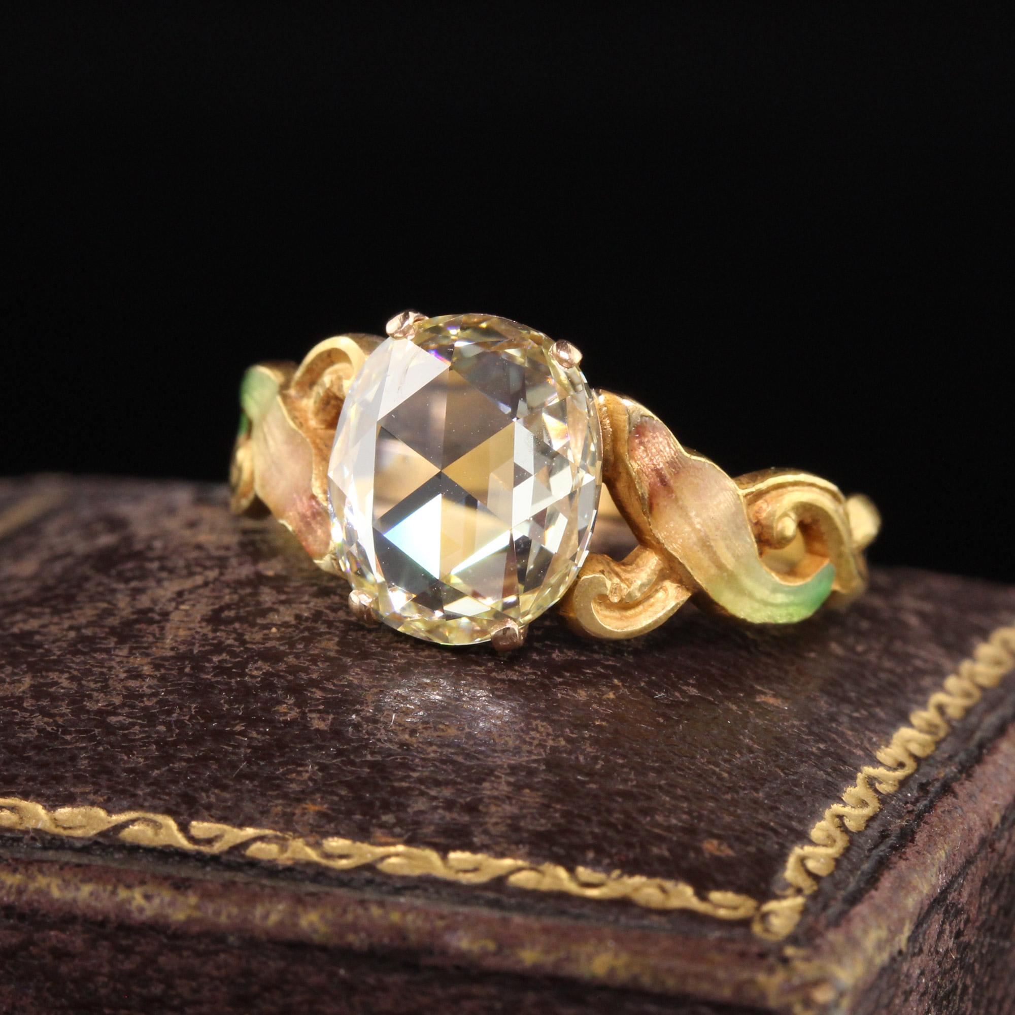 Beautiful Antique Art Nouveau 18K Yellow Gold Domed Rose Cut Diamond Engagement Ring. This incredible Art Nouveau engagement ring is crafted in 18K yellow gold with enamel on the sides. The center is a GIA certified 2.11 ct domed rose cut diamond