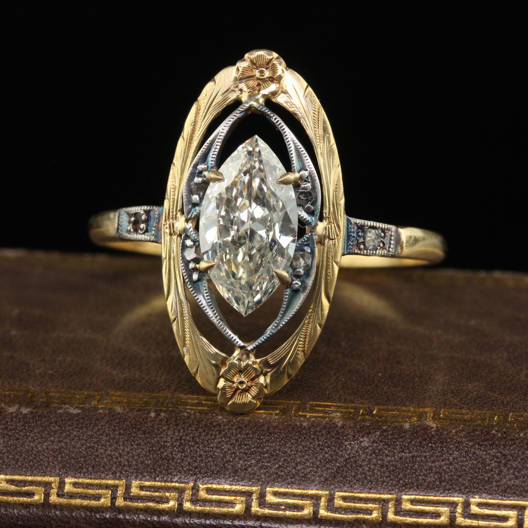 Beautiful Antique Art Nouveau 18K Yellow Gold Old Cut Marquise Engagement Ring - GIA. This gorgeous art nouveau engagement ring is crafted in 18k yellow gold and silver top on some elements. The center holds an old cut marquise cut diamond that has
