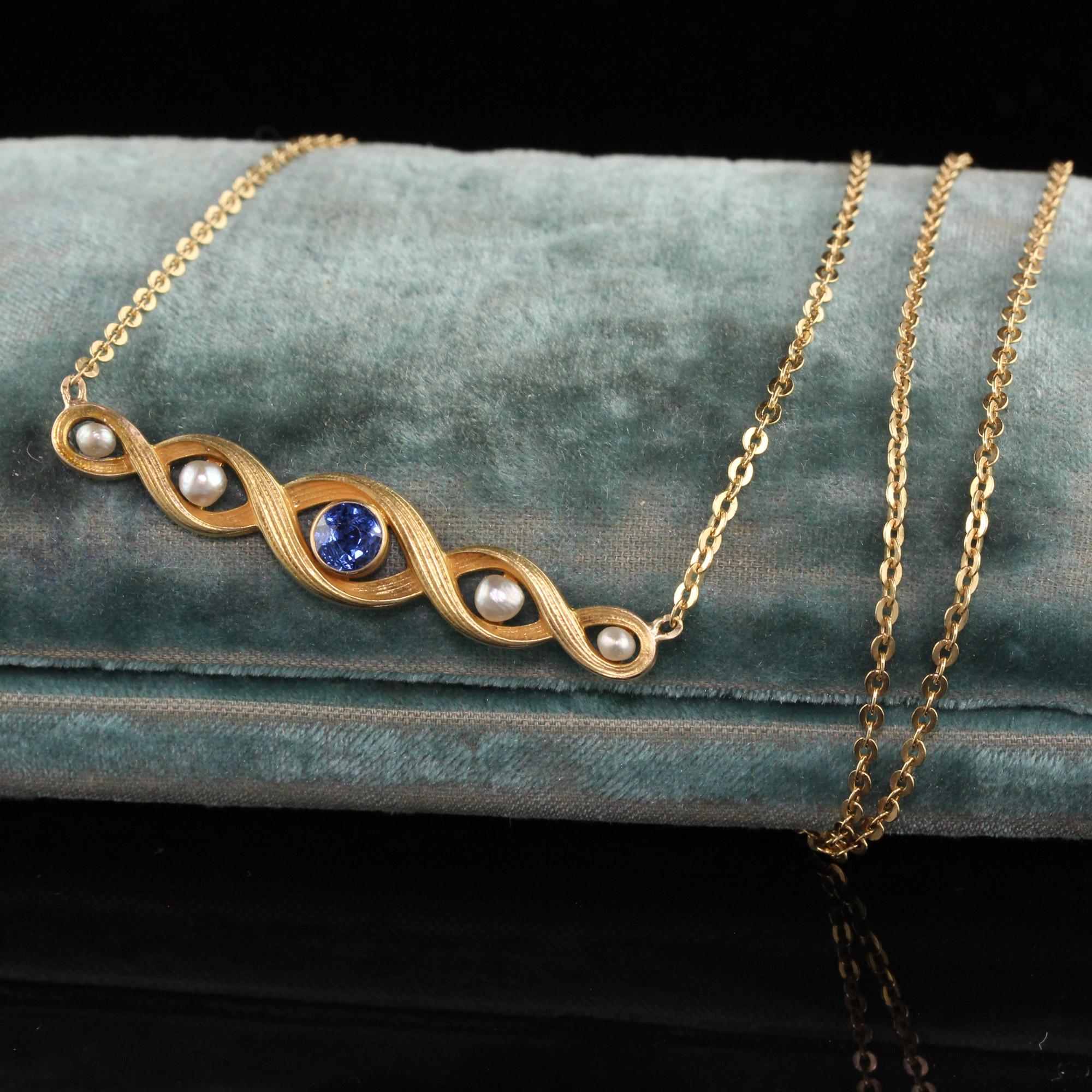 Beautiful Antique Art Nouveau 18K Yellow Gold Yogo Gulch Sapphire Natural Pearl Necklace. This beautiful necklace is crafted in 18k yellow gold. The center holds a natural Yogo Gulch Sapphire that has a GIA report. There are also natural pearls on