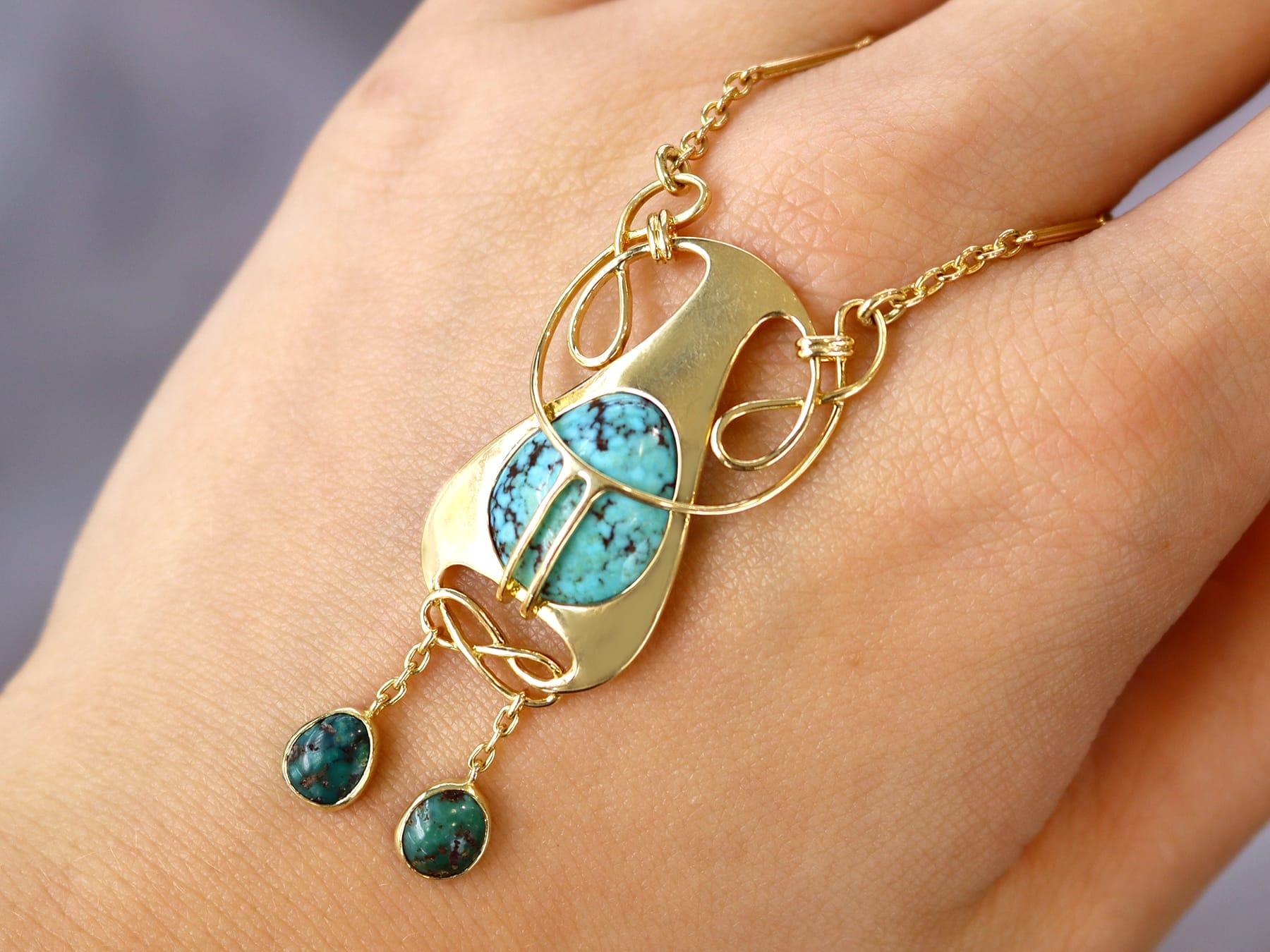 Cabochon Antique Art Nouveau 4.76 Carat Turquoise and 15k Yellow Gold Pendant Circa 1900 For Sale