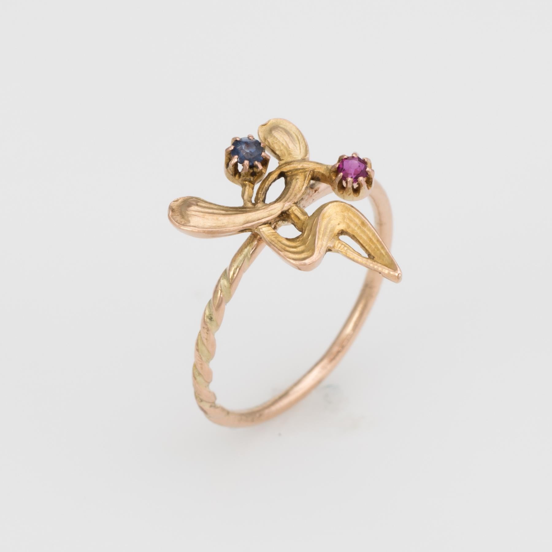 Originally an antique Art Nouveau pin (circa 1880s to 1900s), the abstract ring is crafted in 14 karat yellow gold. 

The abstract design is mounted with the original stick pin. Our jeweler rounded the stick pin into a slim band for the finger. The