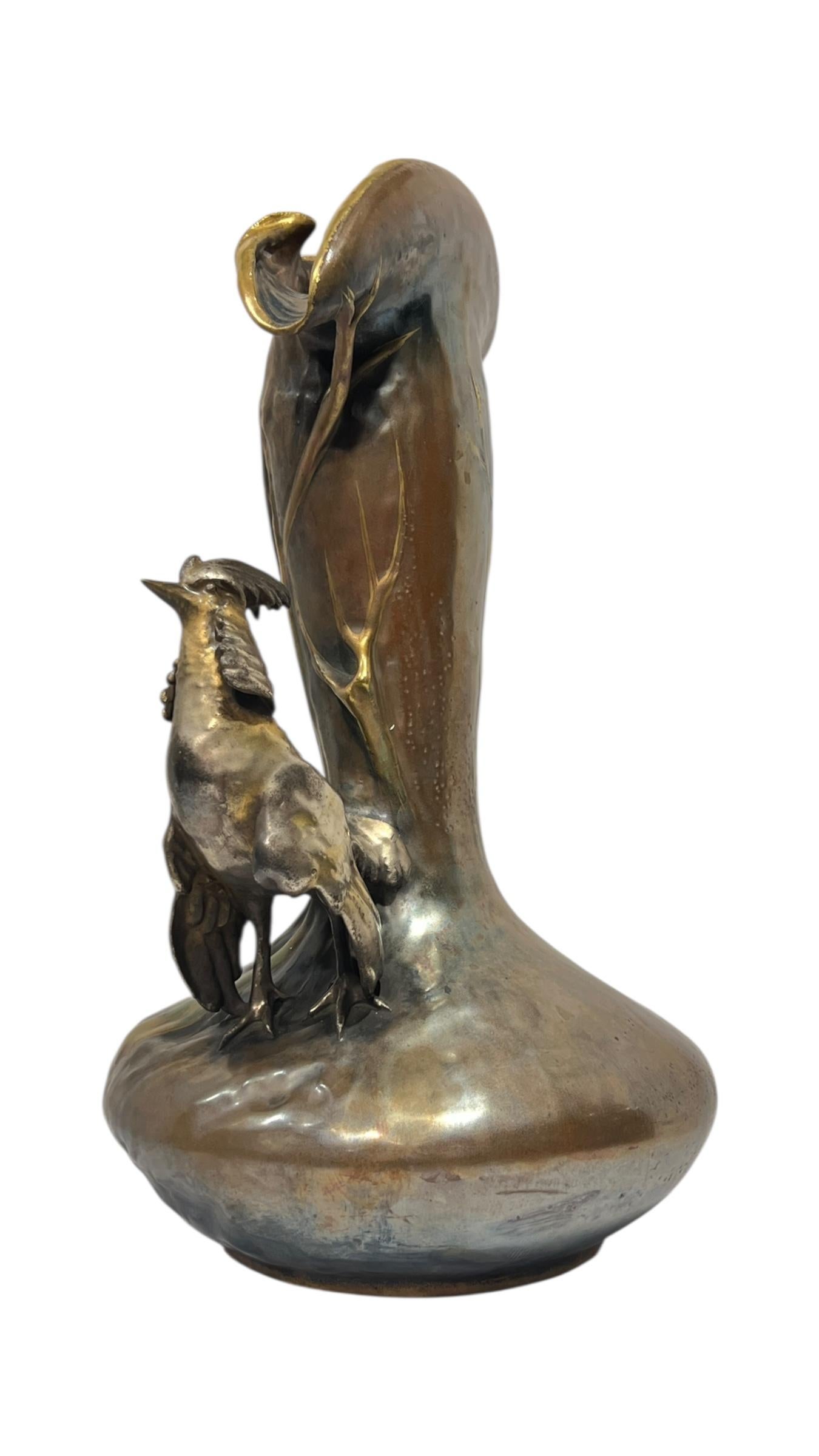 Antique Art Nouveau period Amphora ceramic vase depicting a standing pheasant from Reissner, Stelmacher and Kessel of Turn-Teplitz, Bohemia, circa 1900s, measuring 15 1/2 by 9 by 9 inches.  Excellent condition.