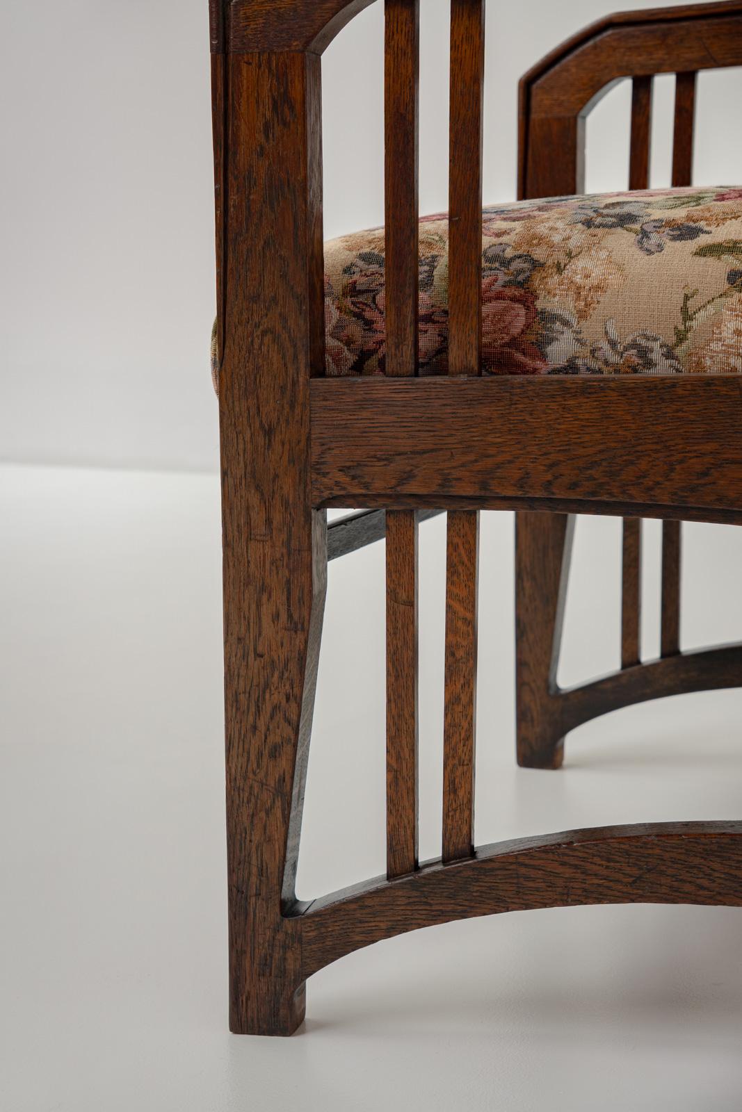 20th Century Antique Art Nouveau Armchair in Solid Oak and Floral Upholstery, Belgium ca 1900 For Sale