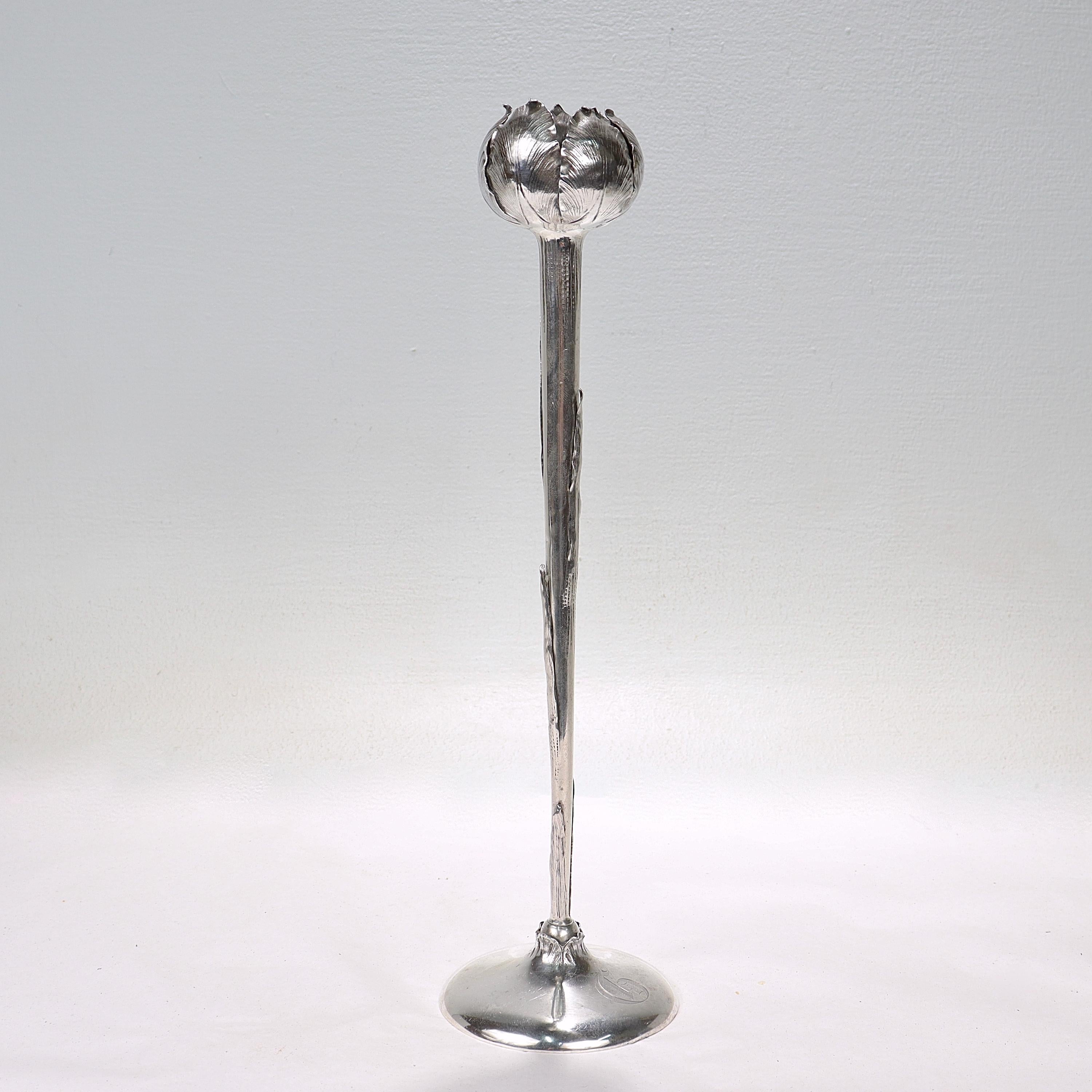 A fine antique sterling silver bud vase.

In the form of a single tall tulip emerging from a monogrammed circular base.

Retailed by Bailey, Banks, and Biddle.

Simply a great American Art Nouveau sterling silver vase! 

Date:
Early 20th