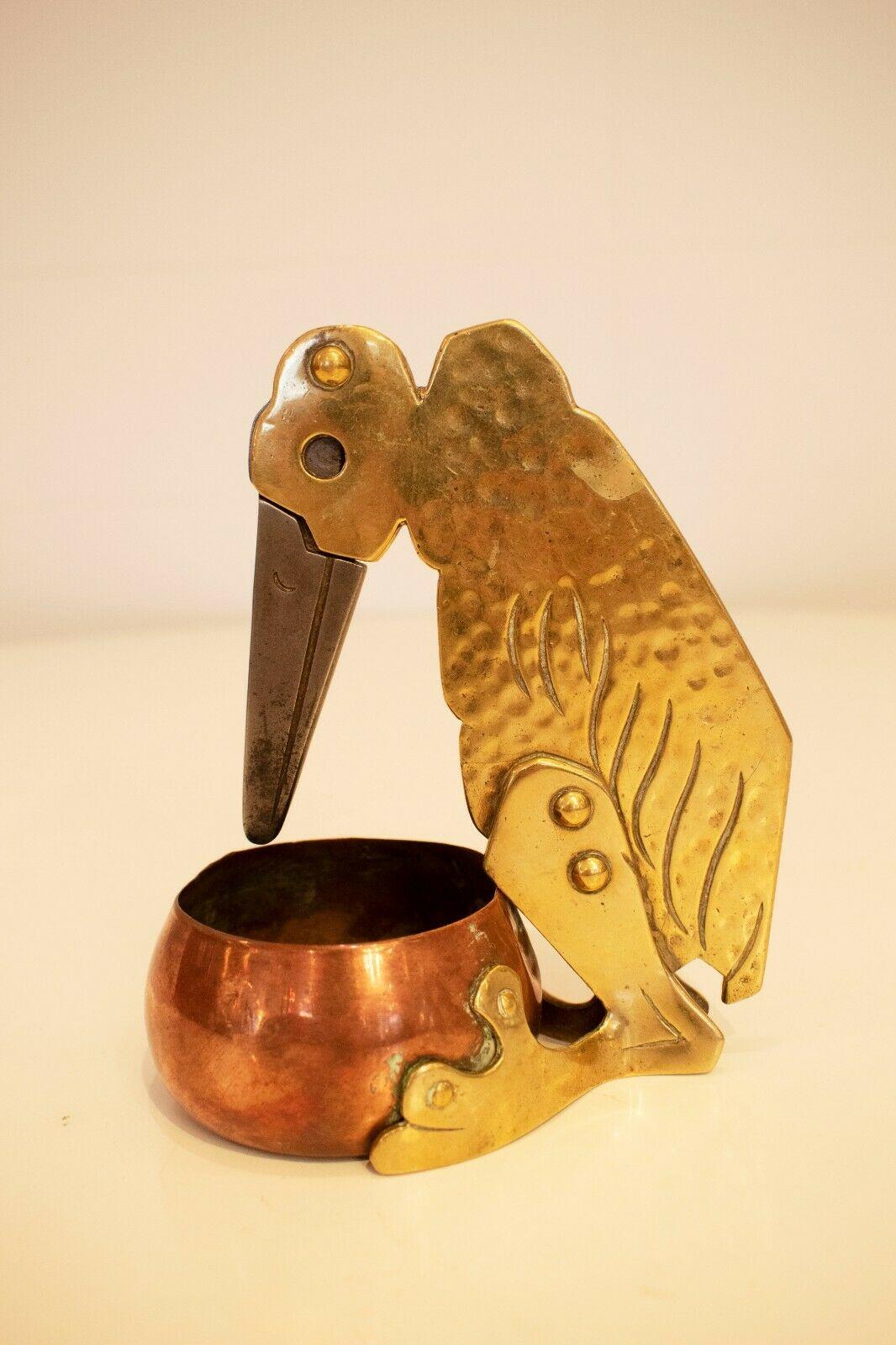 A very decorative and rare Art Nouveau copper cigar cutter, in the shape of an exotic.

Whimsical and fun, this cigar cutter was designed and made by Ignatius Tascher.

This designer (1871-1913) was part of the Secession in Munich and was also