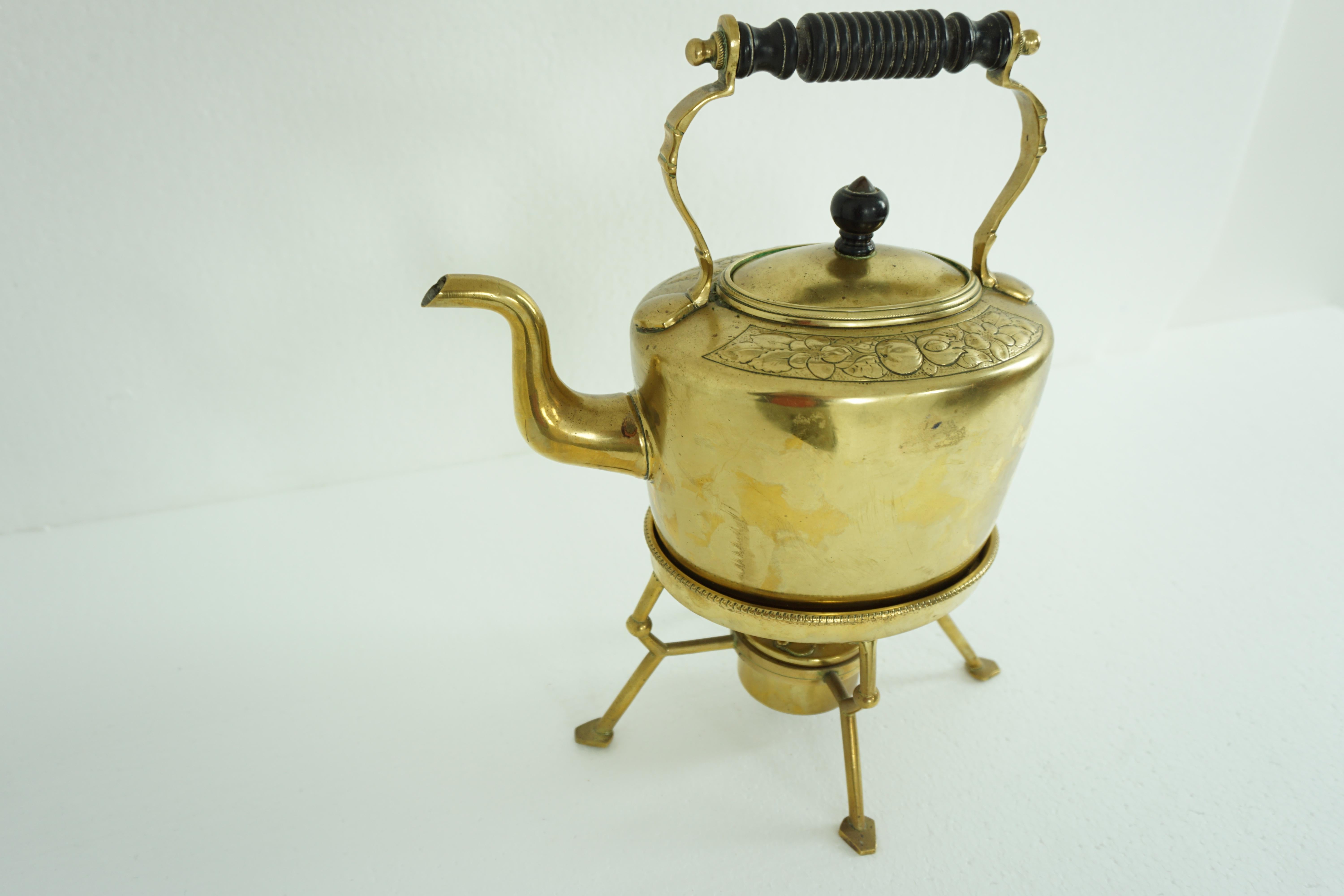 Antique Art Nouveau brass kettle on stand with burner, Scotland 1910 1954

Scotland 

1910
Solid brass
Very good condition
Wooden ladle on top
Lovely chisel Art Nouveau
Decoration around the edge
Lift up lid
Kettle sits on four-legged