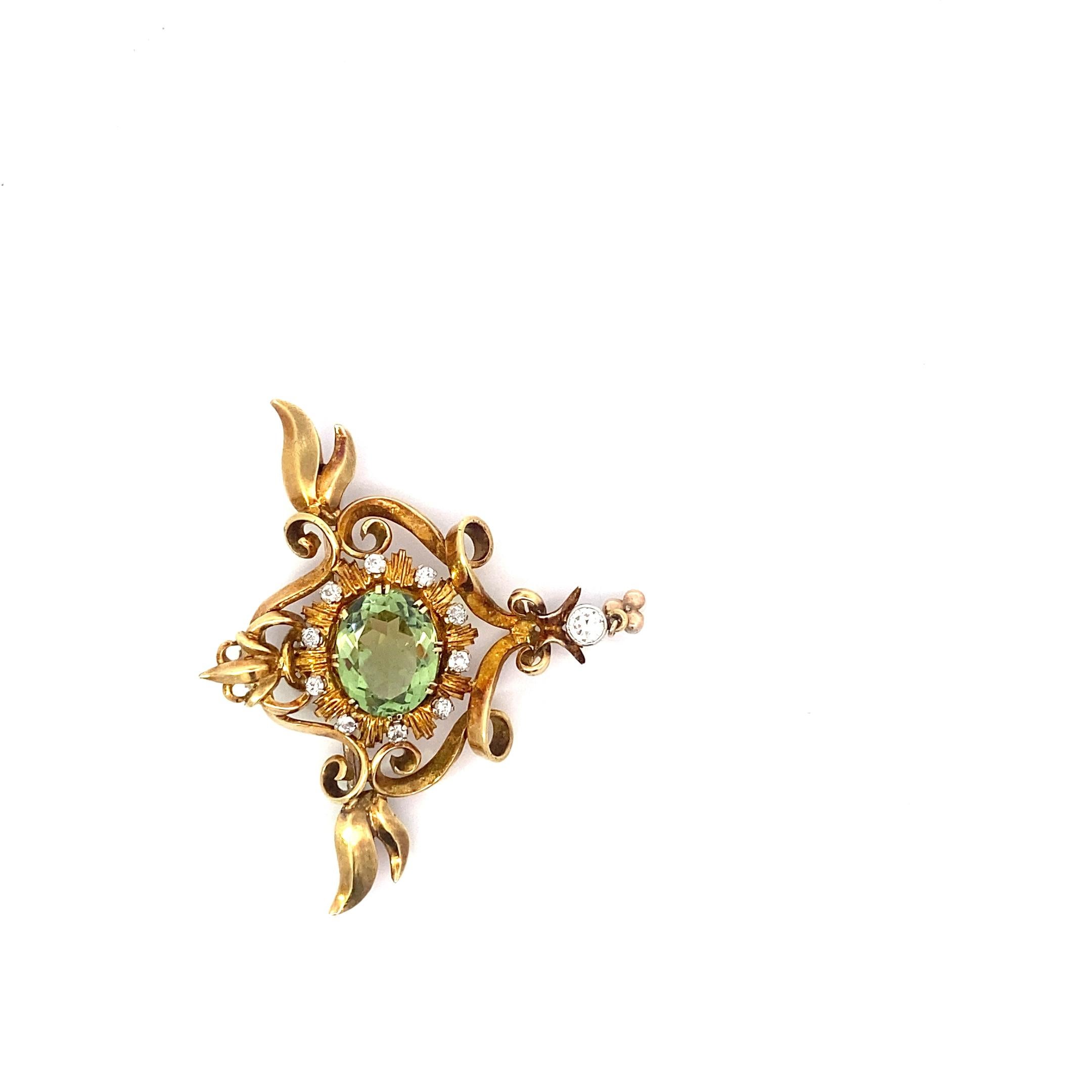 This one of a kind brooch, made in the early 20th century, features a gorgeous sparkling brilliant cut peridot stone. The peridot is transparent with no visible inclusions. 

As was typical of this era, the piece also features some small diamonds