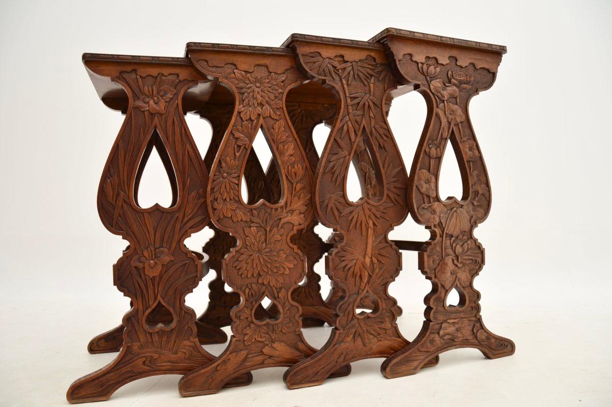 Wood Antique Art Nouveau Carved Nest of Four Tables For Sale