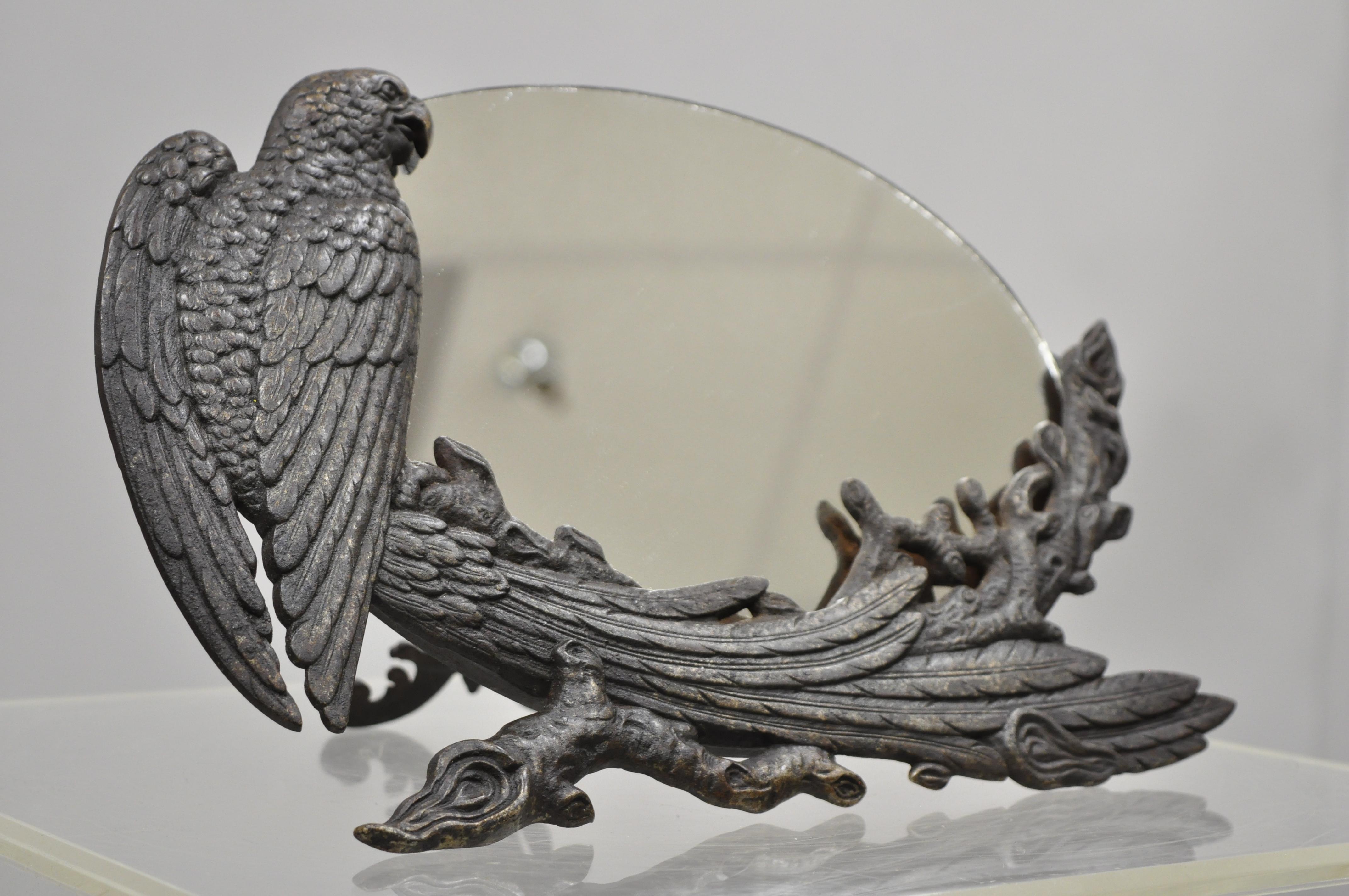 Antique Art Nouveau cast iron eagle phoenix bird vanity tabletop mirror, circa early 20th century. Measurements: 8
